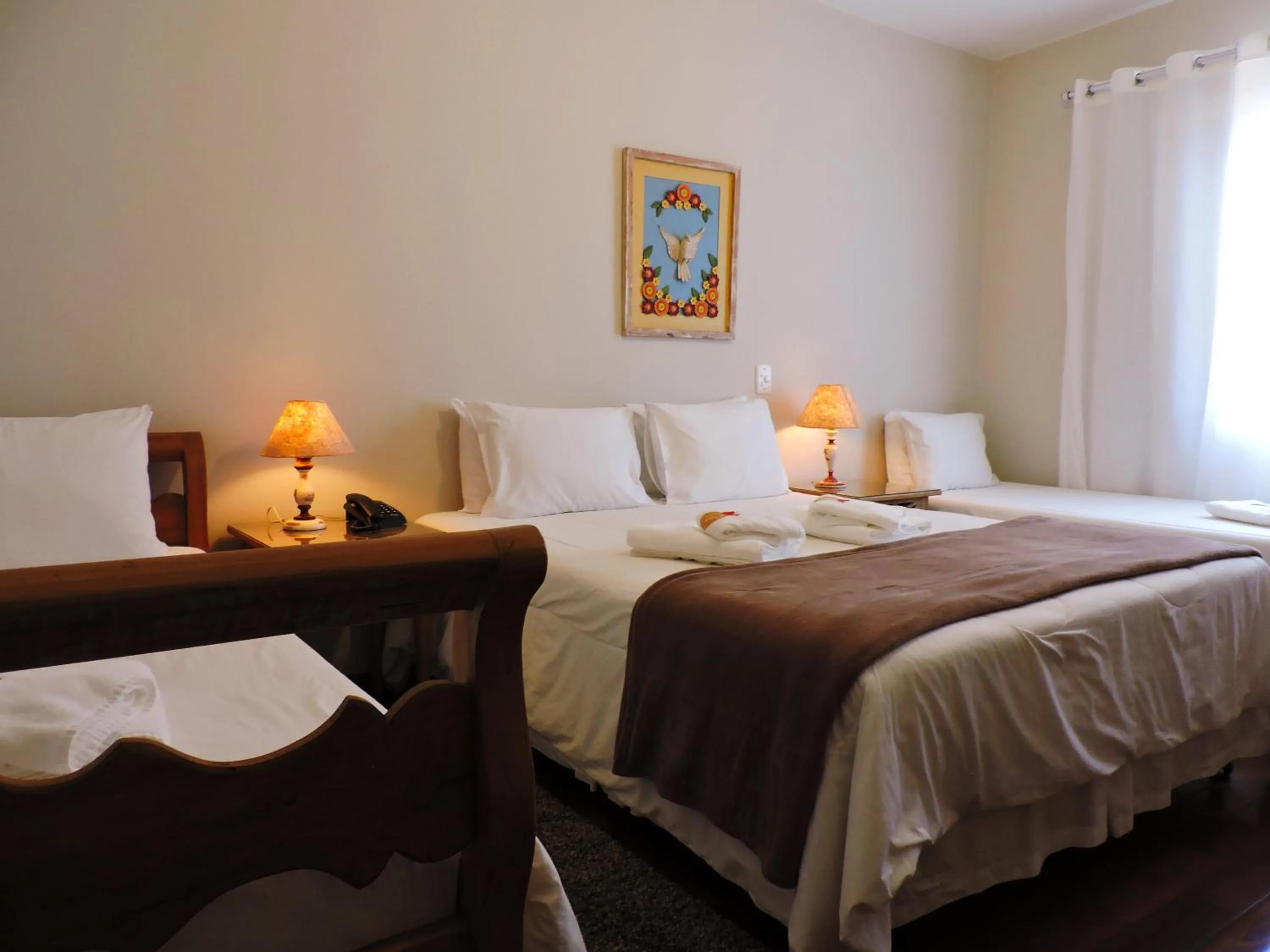 Bed in Pousada Ouro de Minas