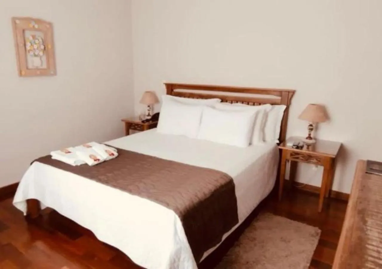 Bed in Pousada Ouro de Minas