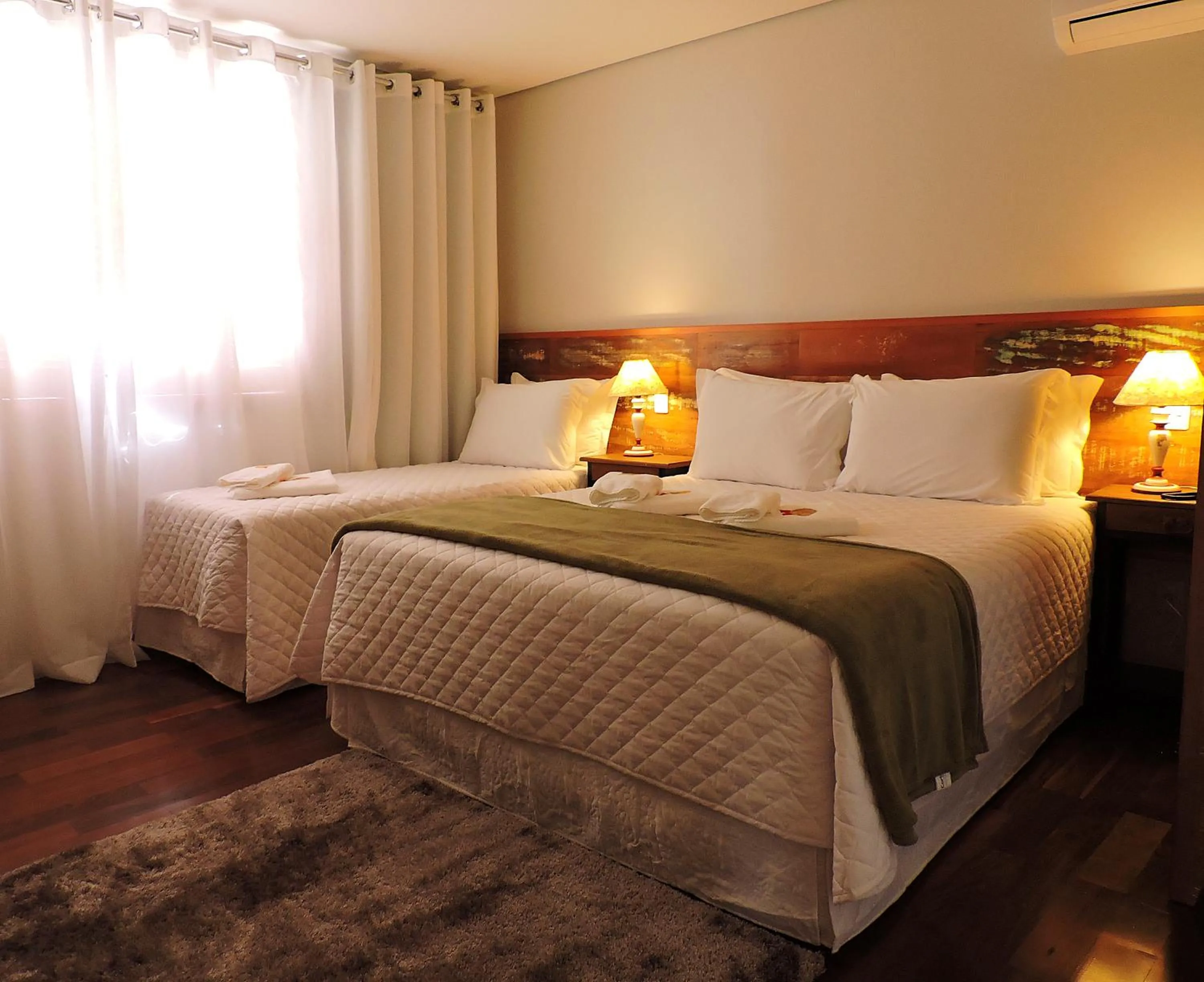 Bed in Pousada Ouro de Minas