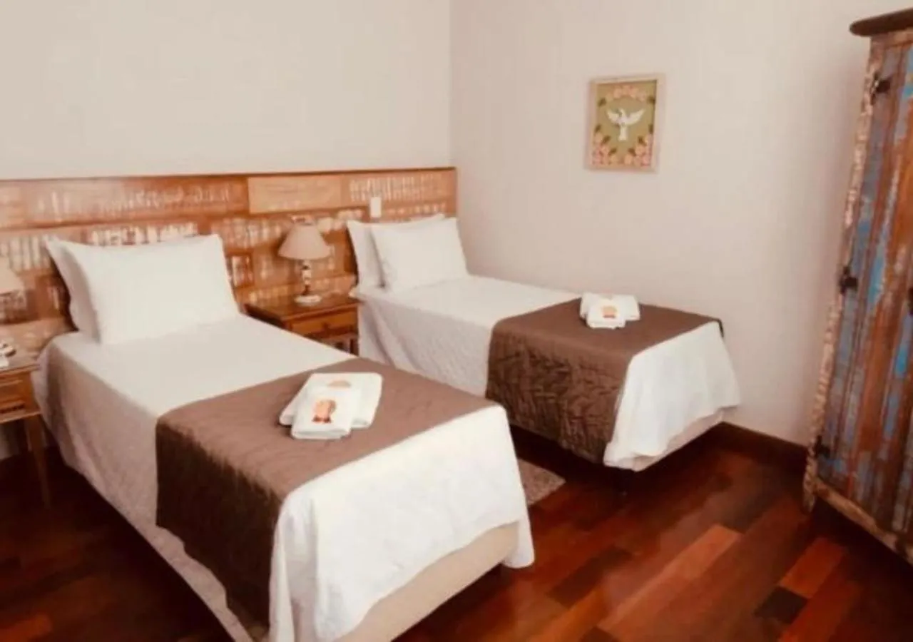Bed in Pousada Ouro de Minas