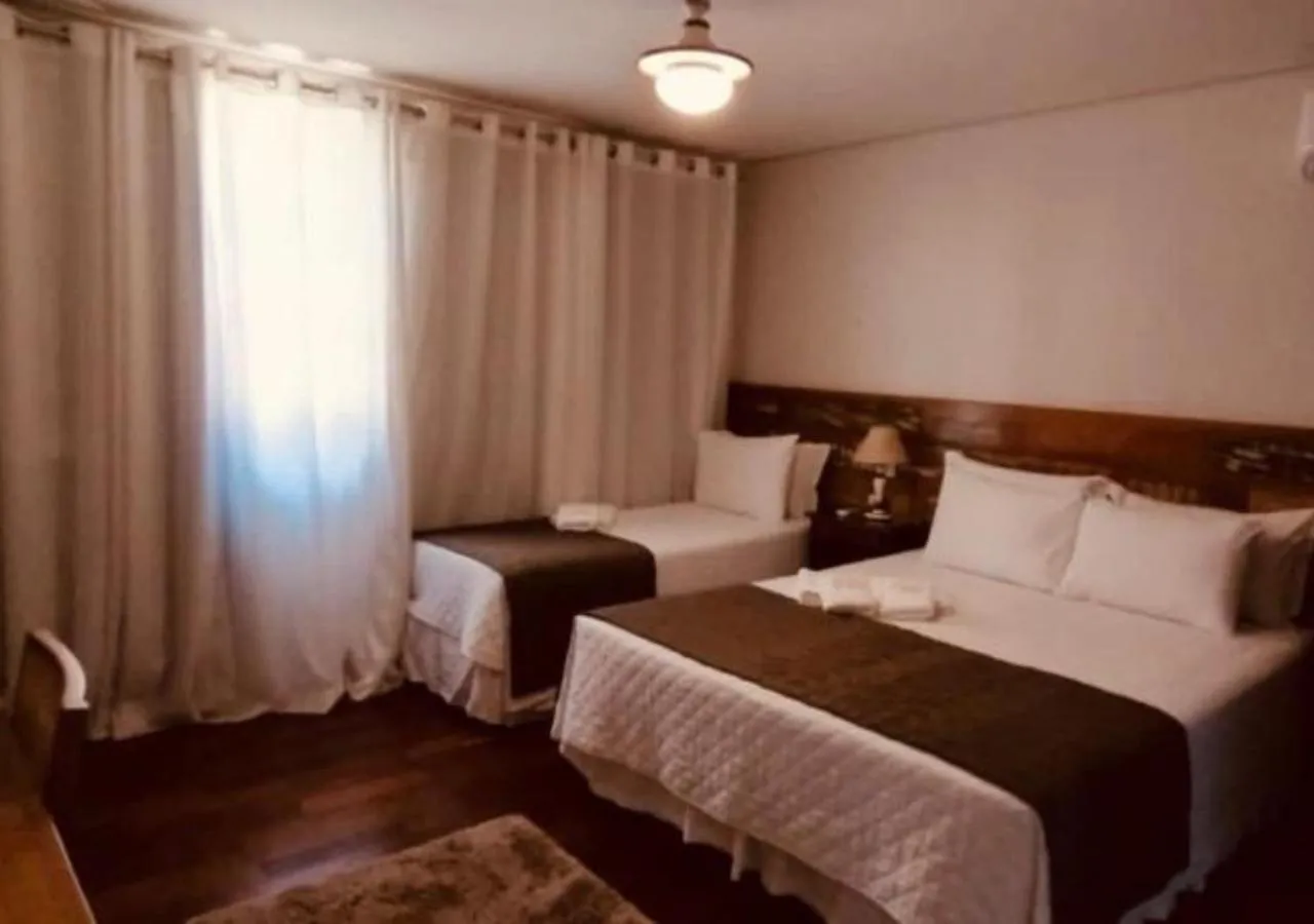 Bed in Pousada Ouro de Minas