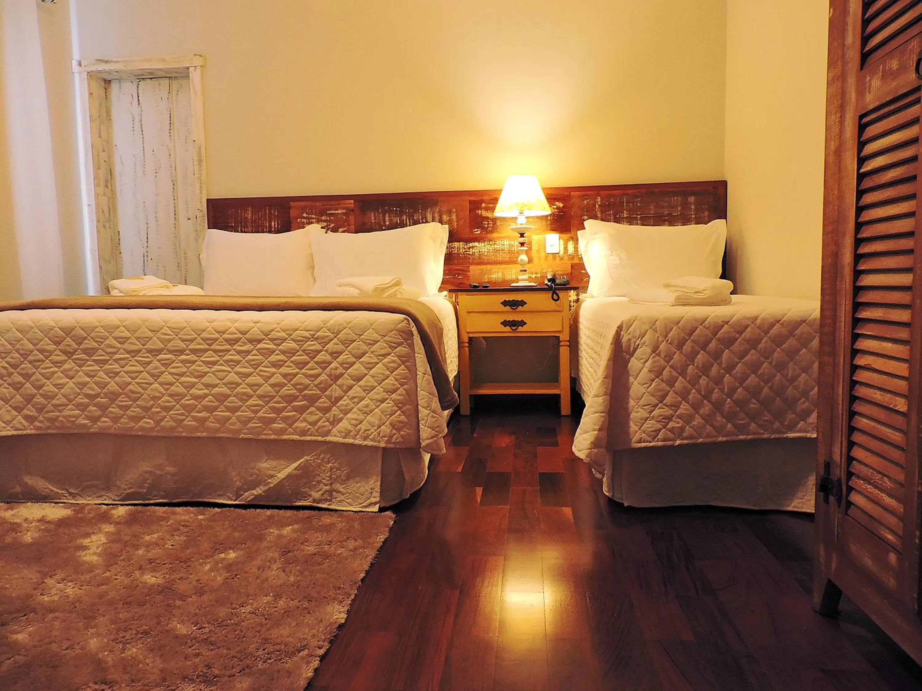 Bed in Pousada Ouro de Minas