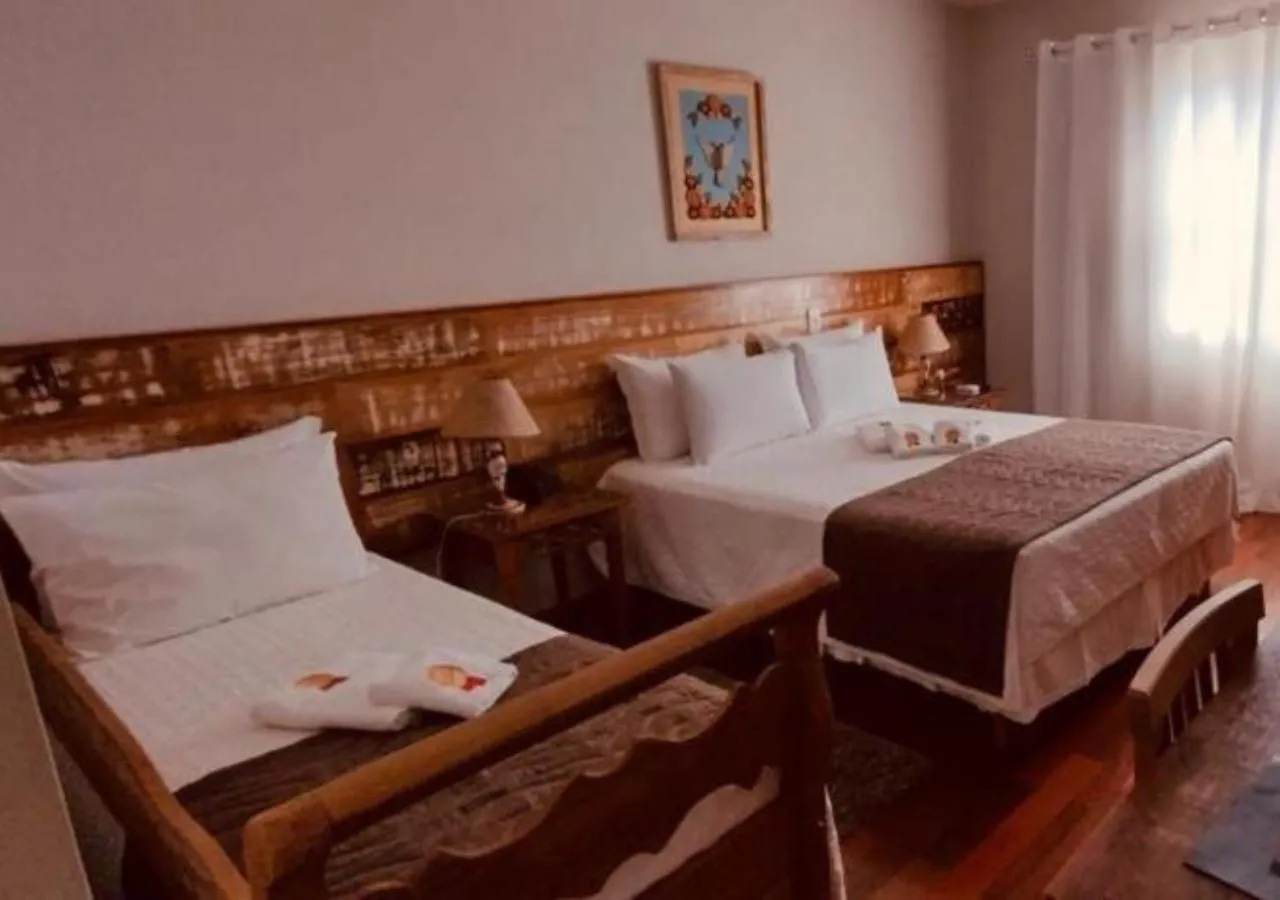 Bed in Pousada Ouro de Minas