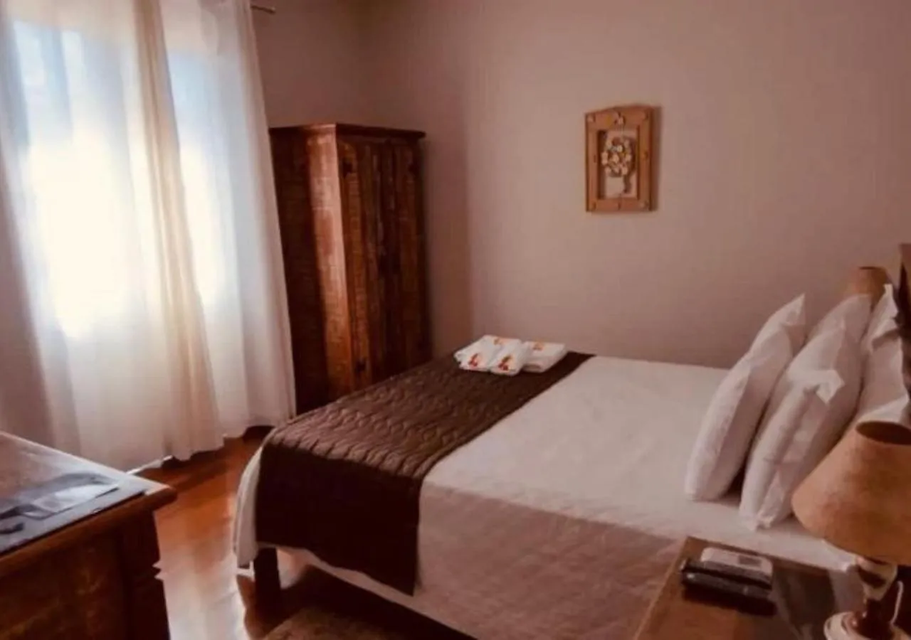 Bed in Pousada Ouro de Minas
