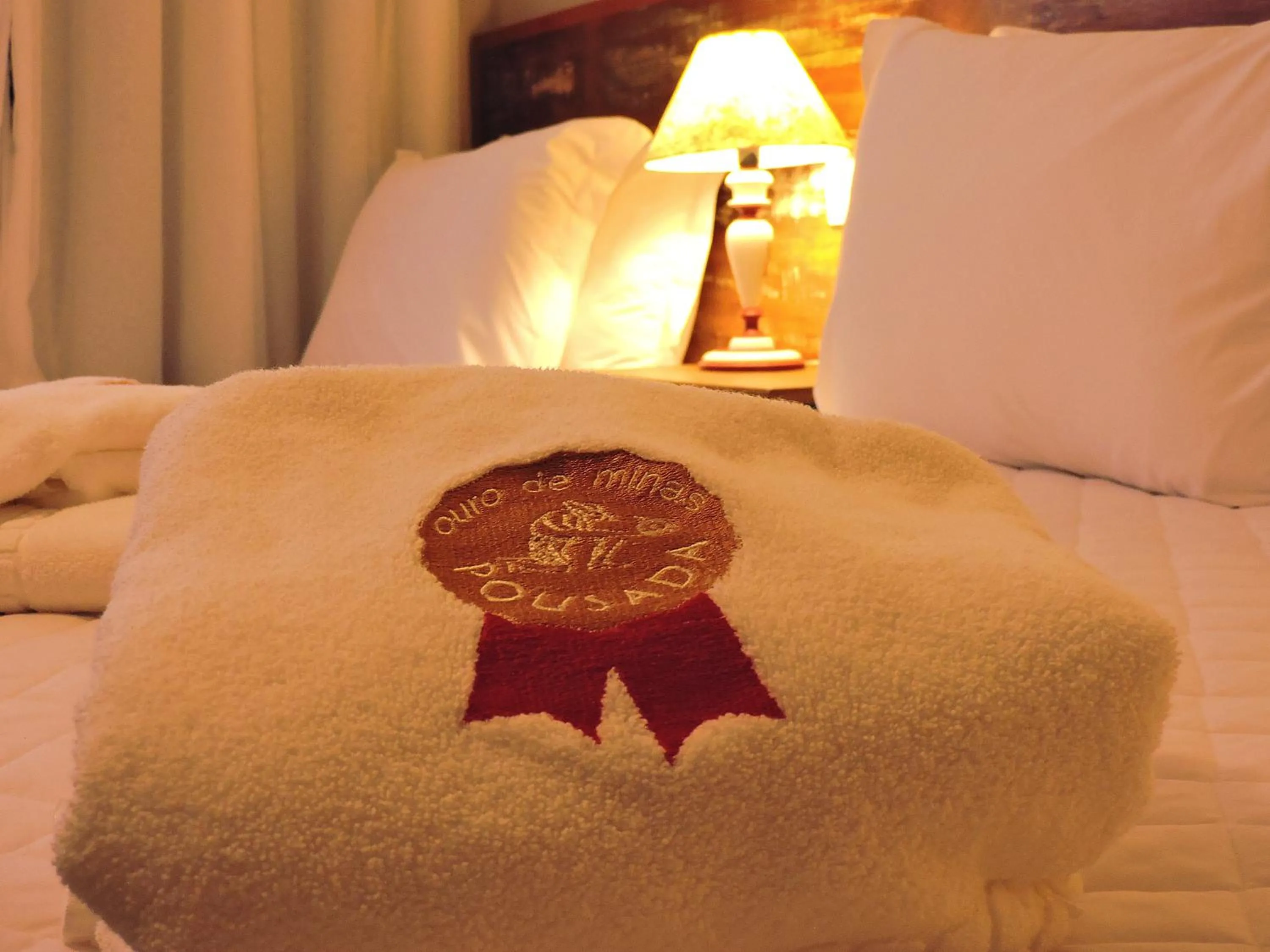 Bed in Pousada Ouro de Minas