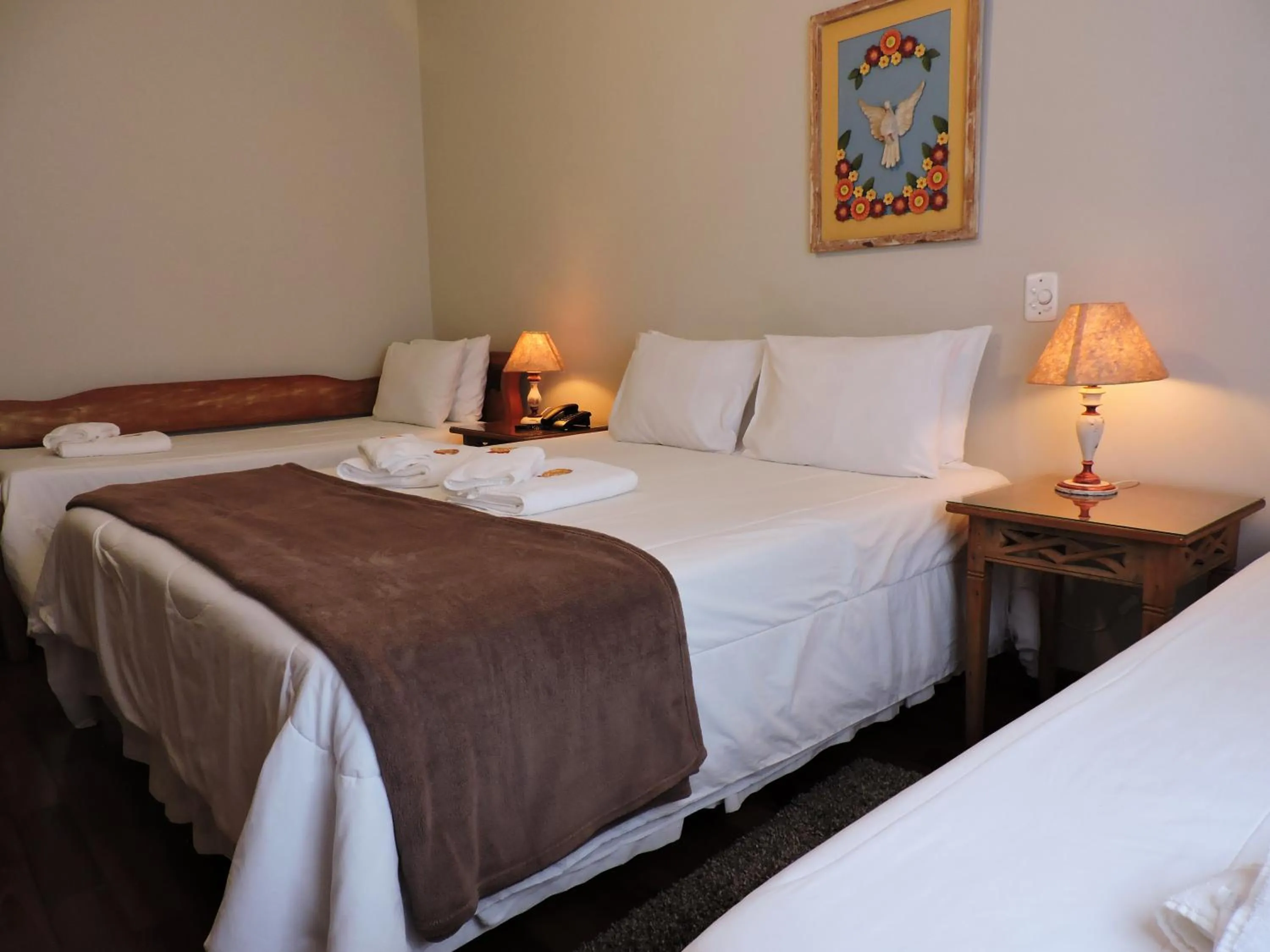 Bed in Pousada Ouro de Minas