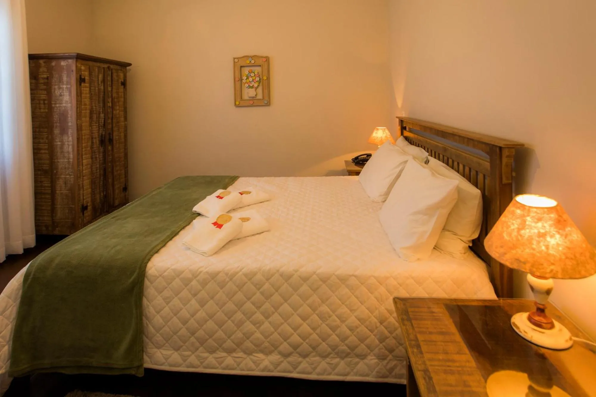 Bed in Pousada Ouro de Minas