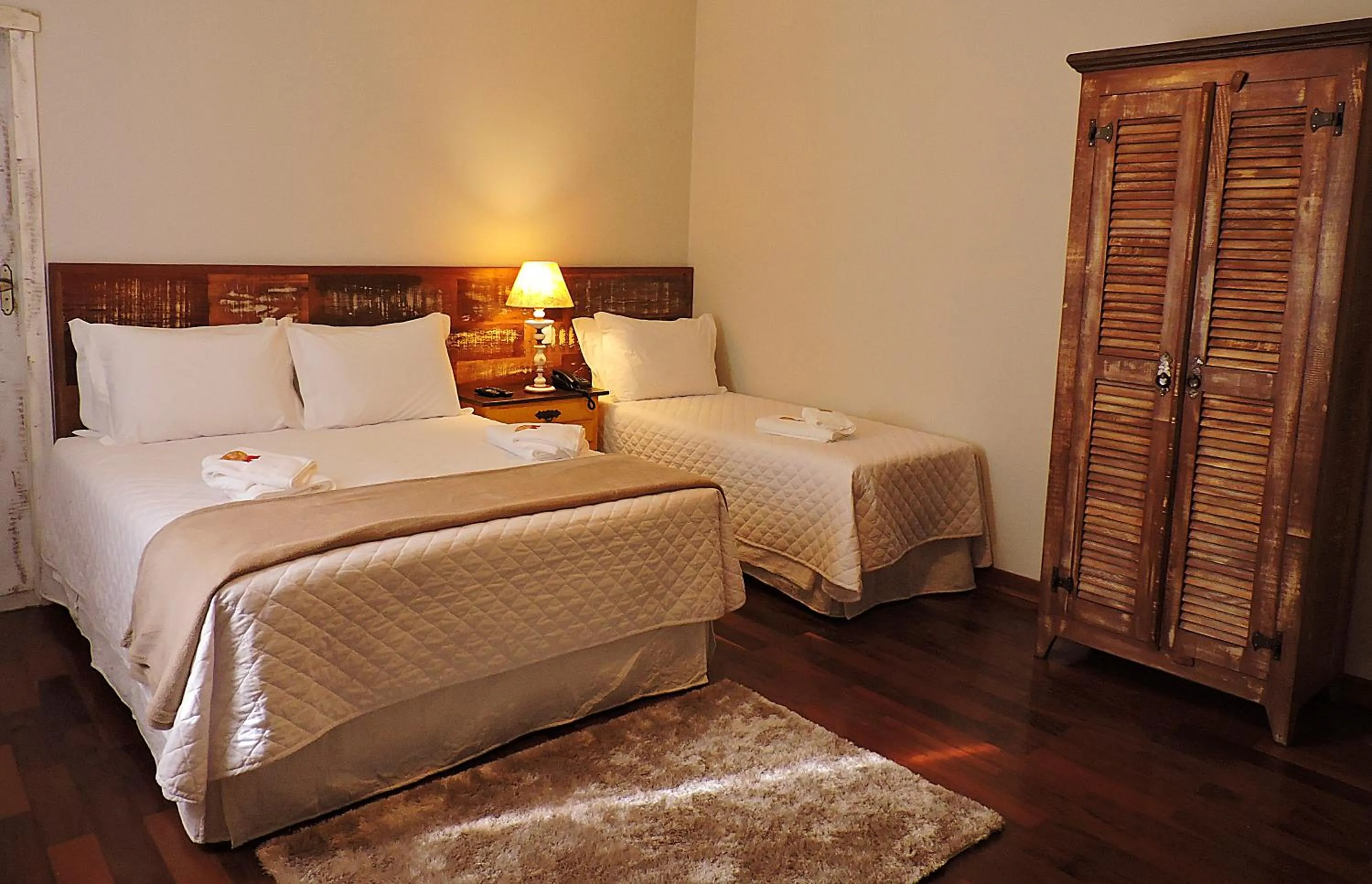 Bed in Pousada Ouro de Minas