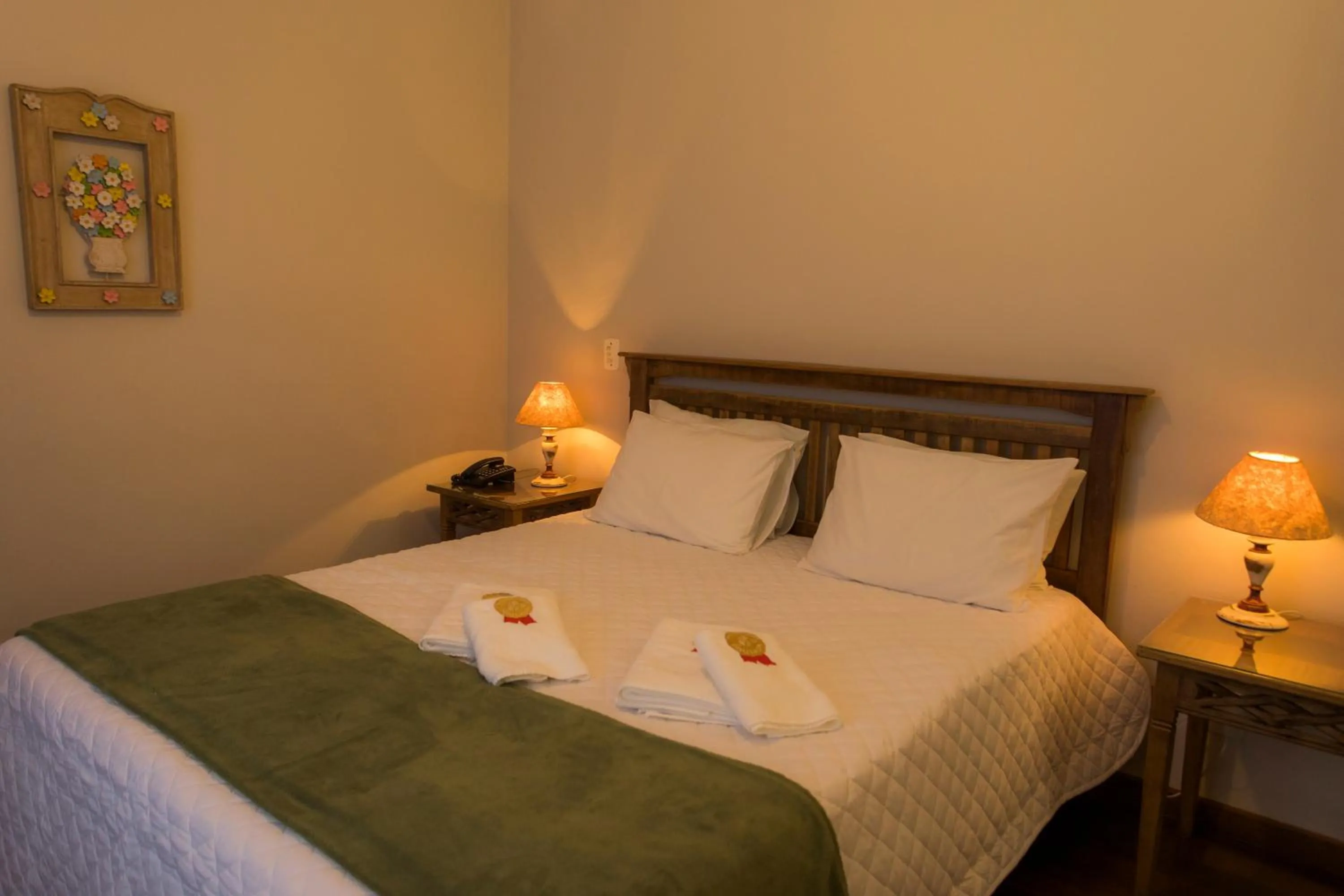 Bed in Pousada Ouro de Minas