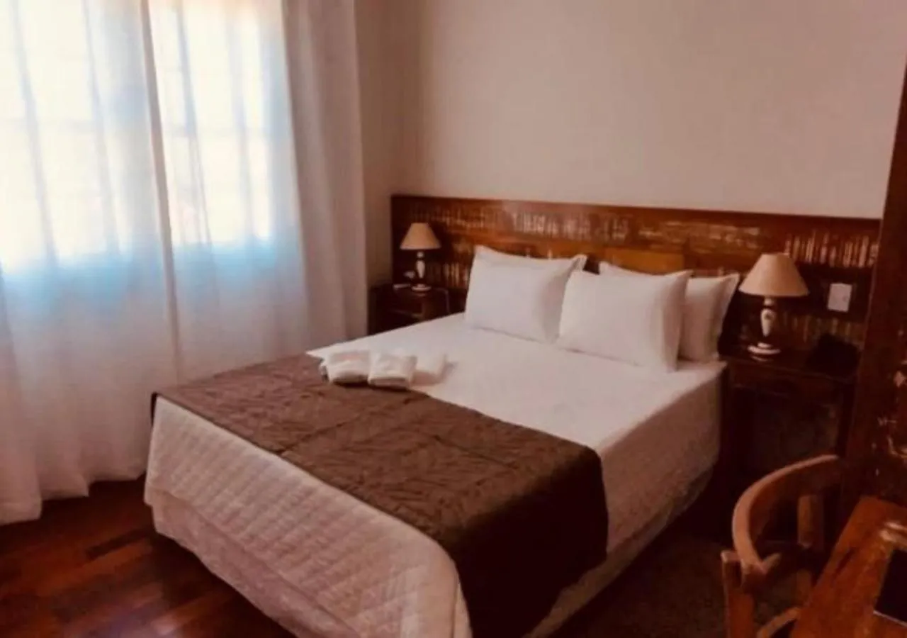 Bed in Pousada Ouro de Minas