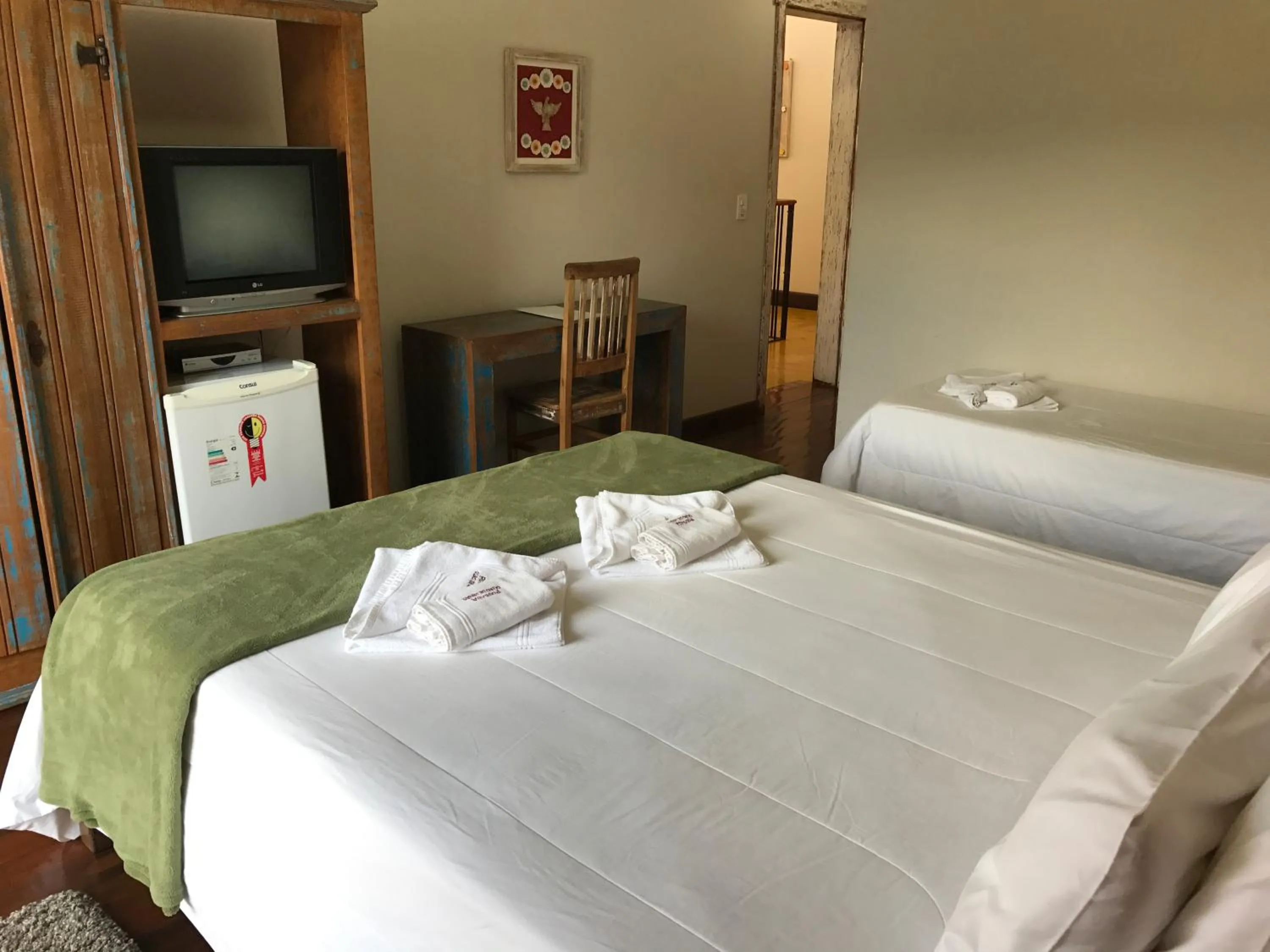 Bed in Pousada Ouro de Minas