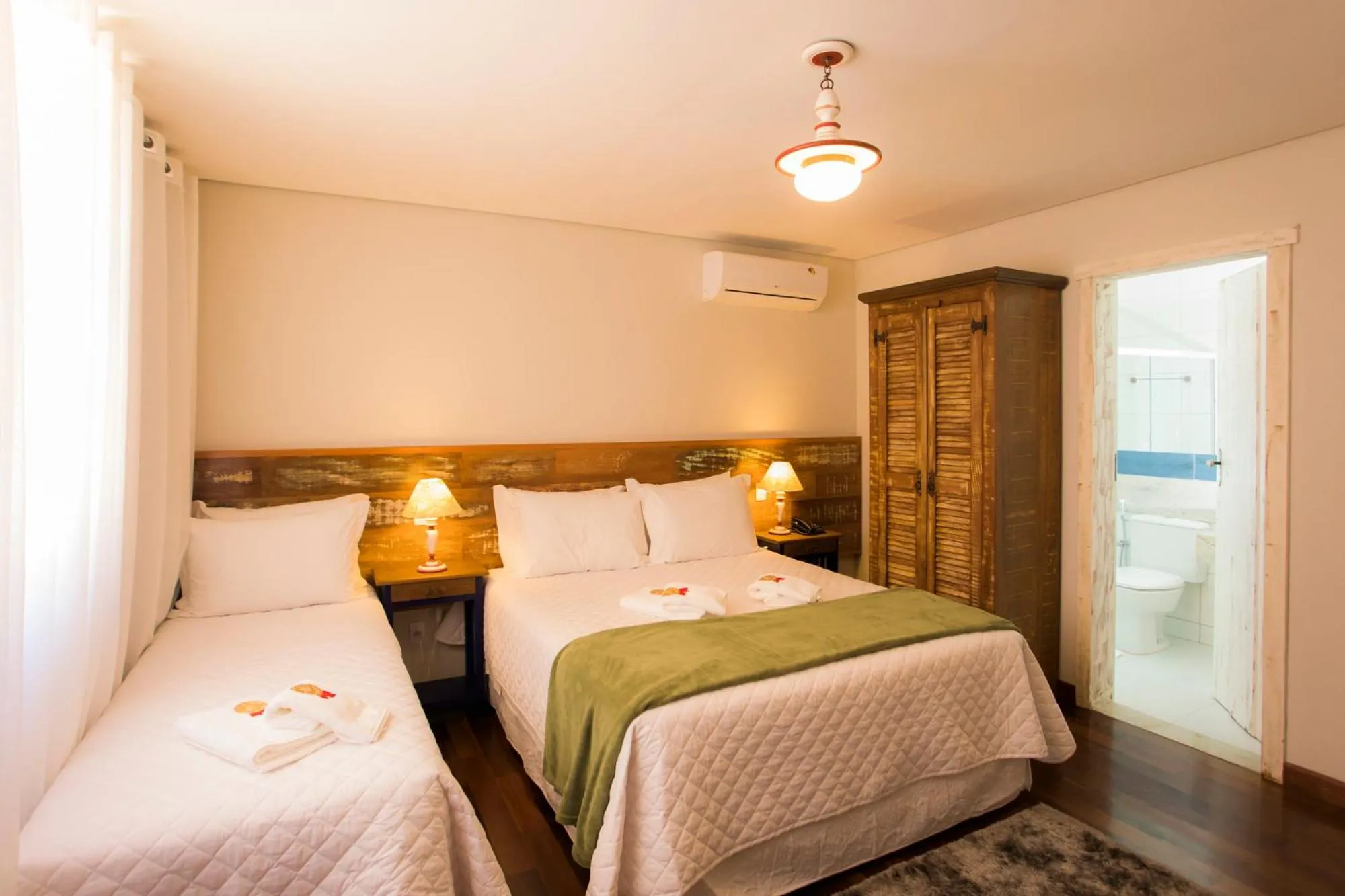 Bed in Pousada Ouro de Minas