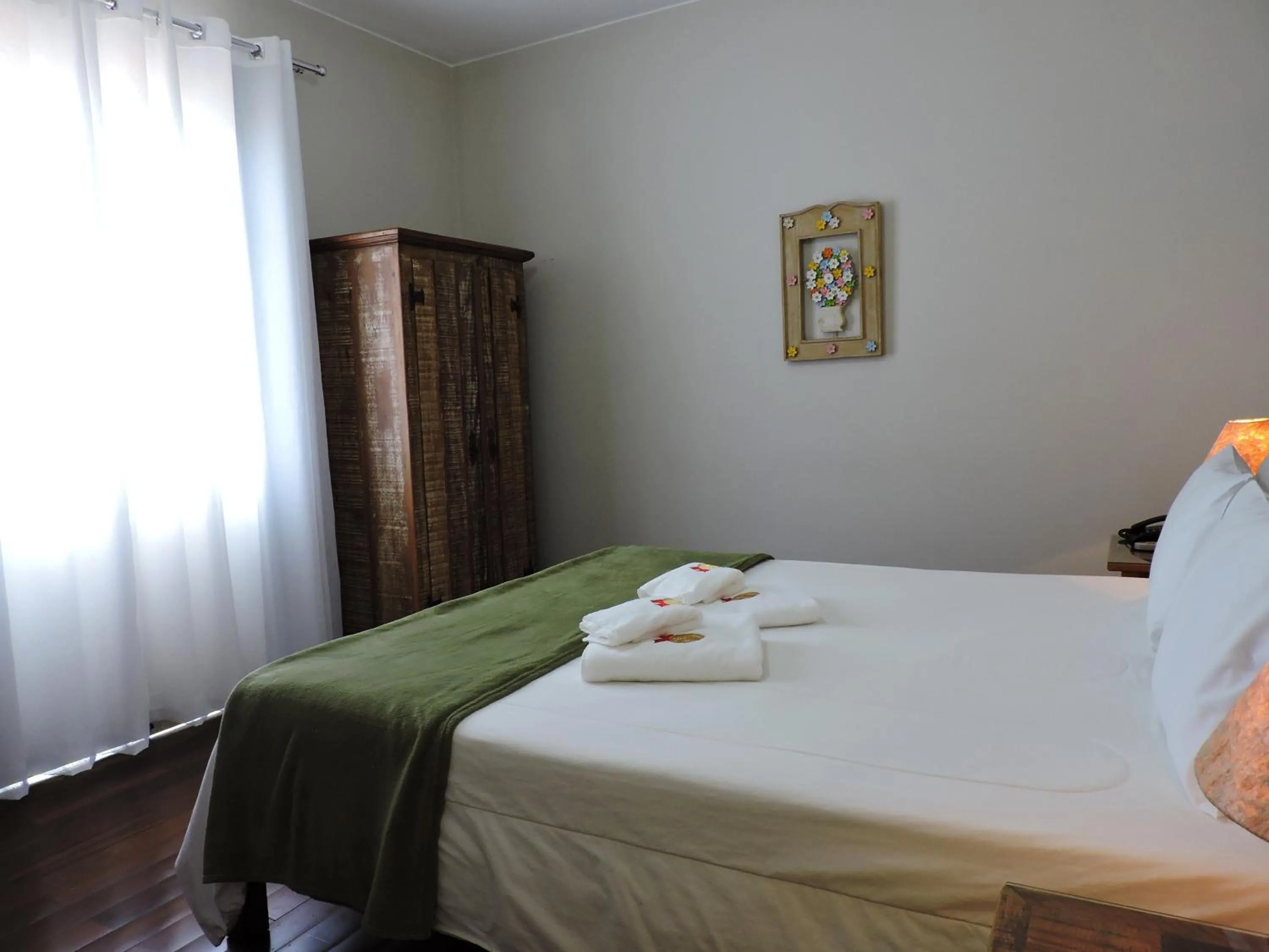 Bed in Pousada Ouro de Minas