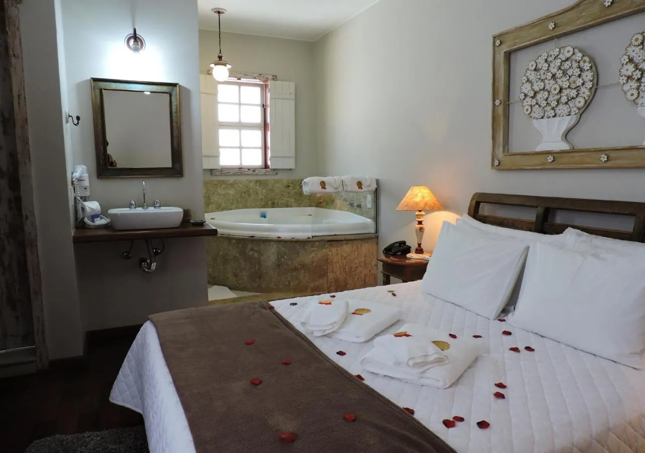 Bed in Pousada Ouro de Minas