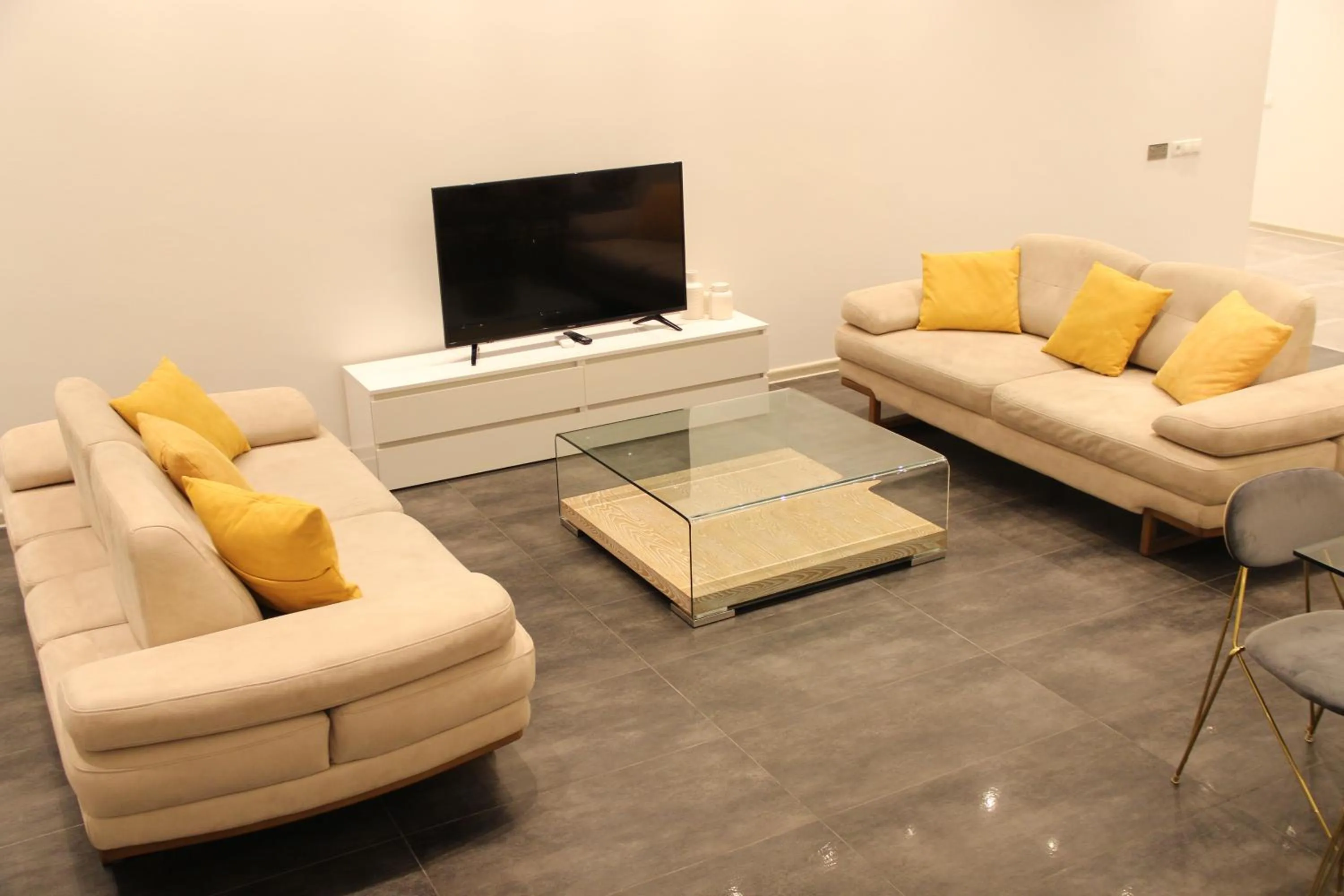 Communal lounge/ TV room in Superior Apartments