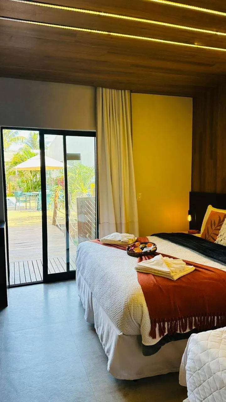Bed in Pousada Gaucha