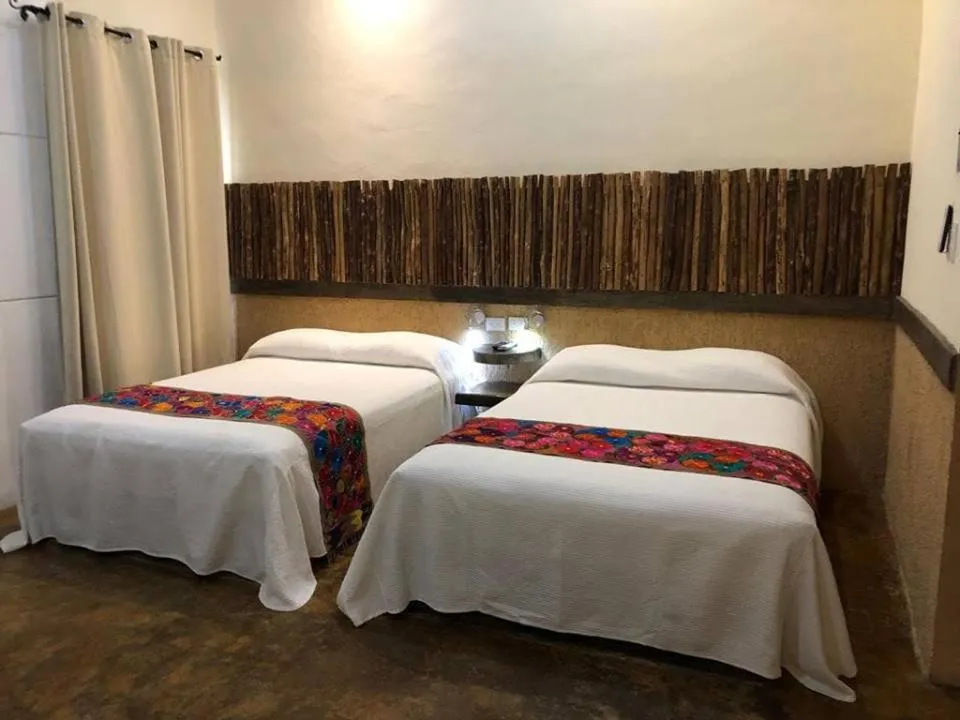 Photo of the whole room, Bed in Casa Sisal Valladolid Yuc