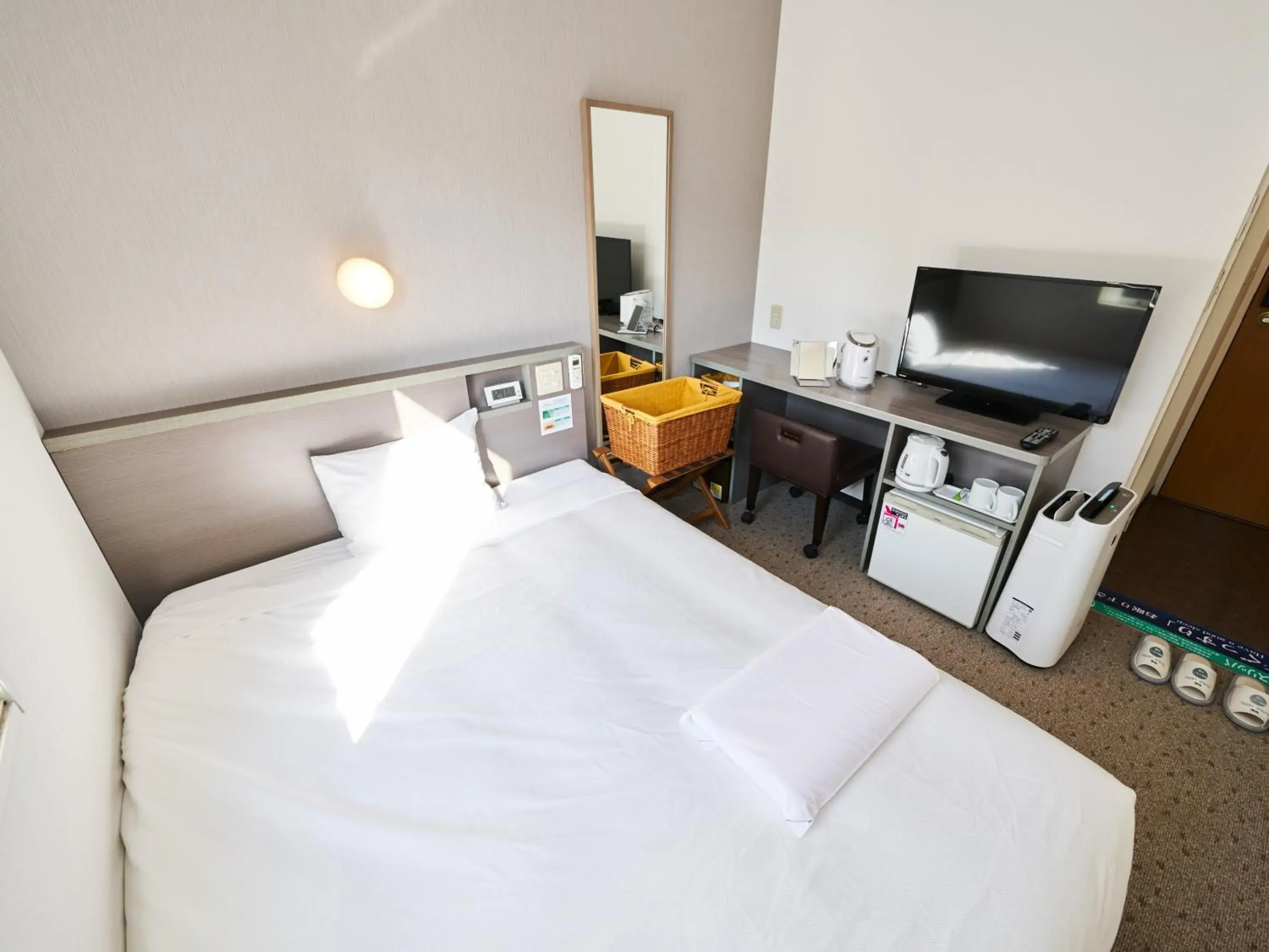 Bed in Super Hotel Tokyo Nihombashi Mitsukoshimae Bed in Super Hotel Tokyo Nihombashi Mitsukoshimae