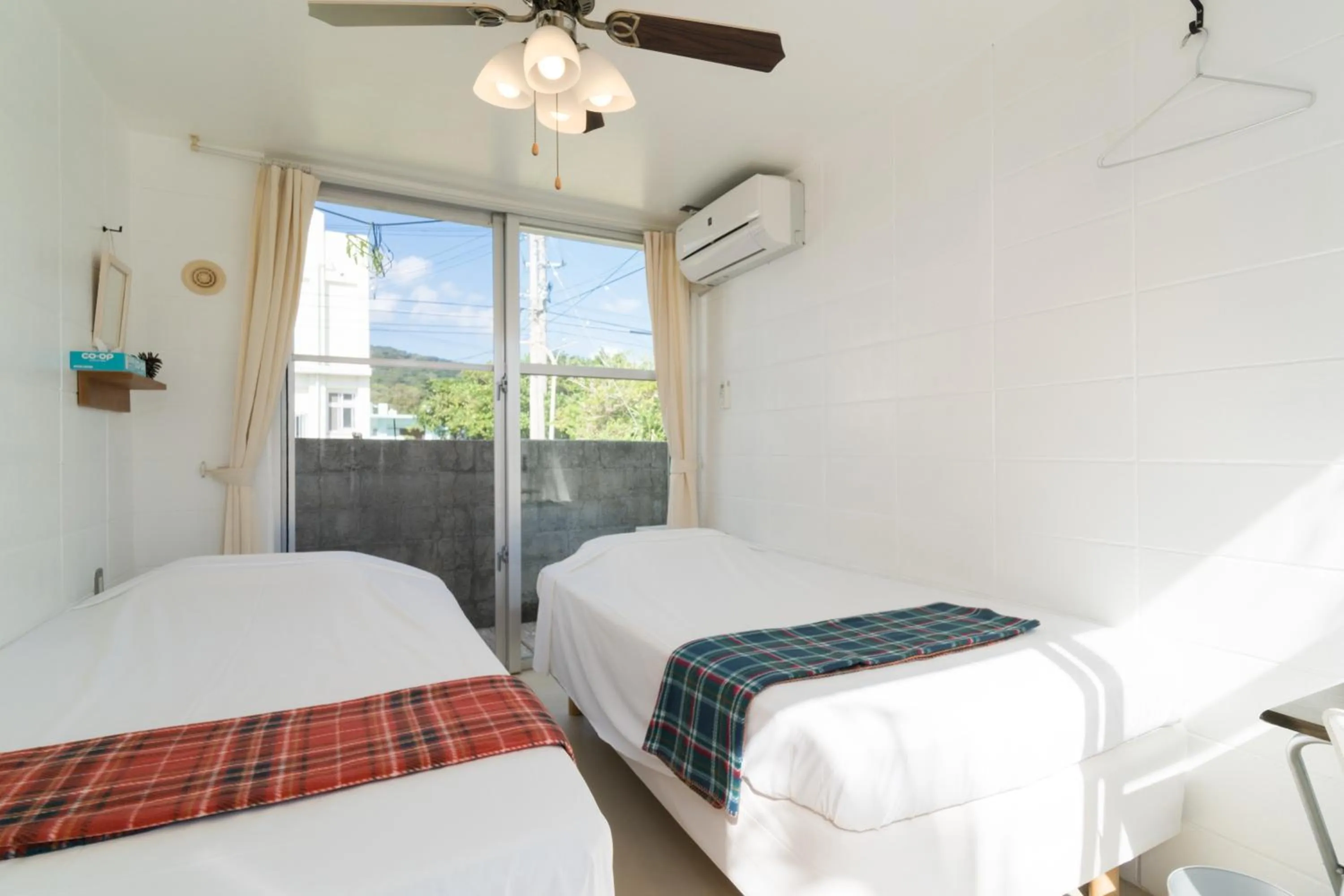 Bed in Hanamuro Inn Aka Island