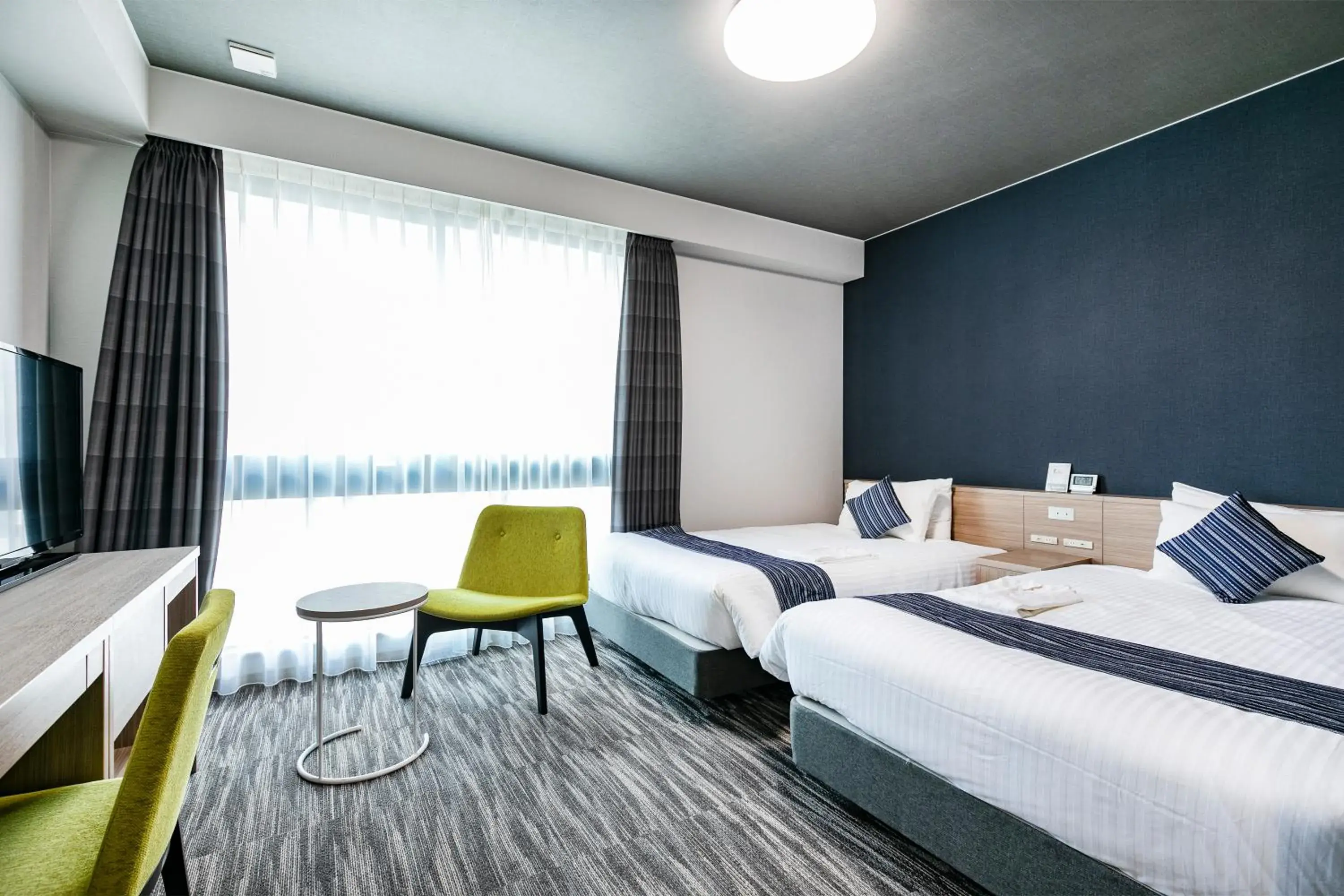 Bed in Shizutetsu Hotel Prezio Hakataekimae Bed in Shizutetsu Hotel Prezio Hakataekimae