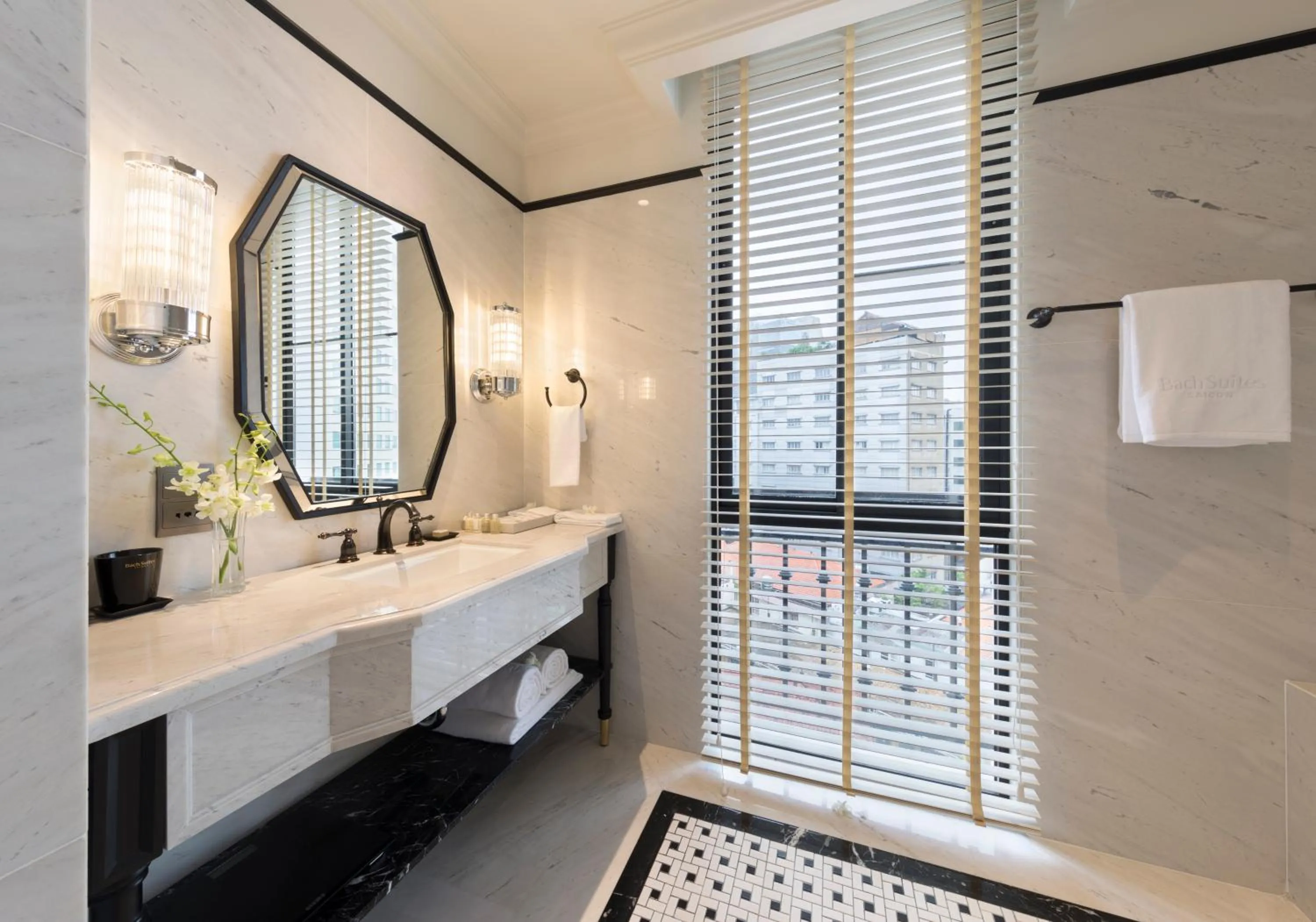 Bathroom, Bed in Bach Suites Saigon, a Member of Design Hotels