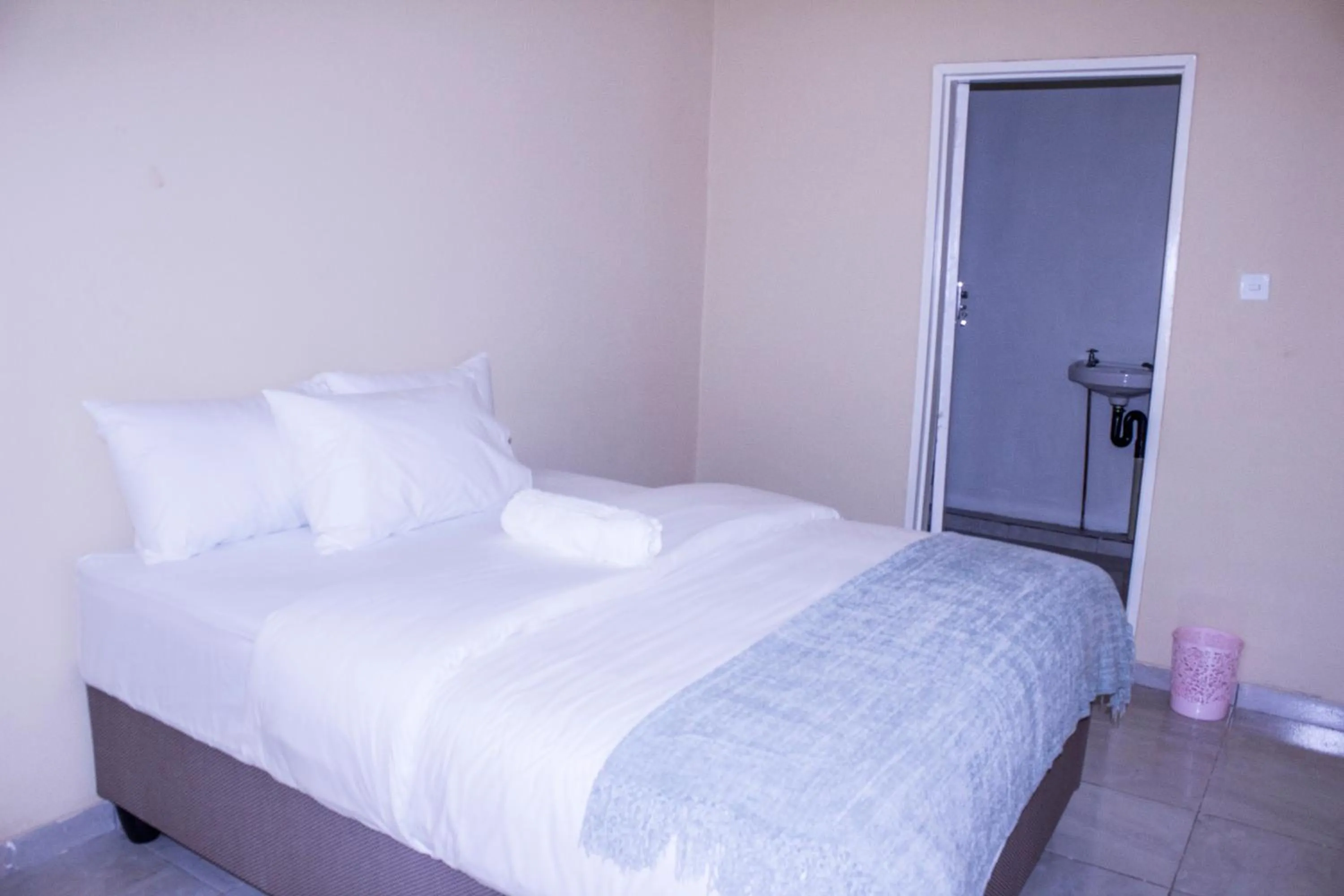 Bed in Royal Guest House