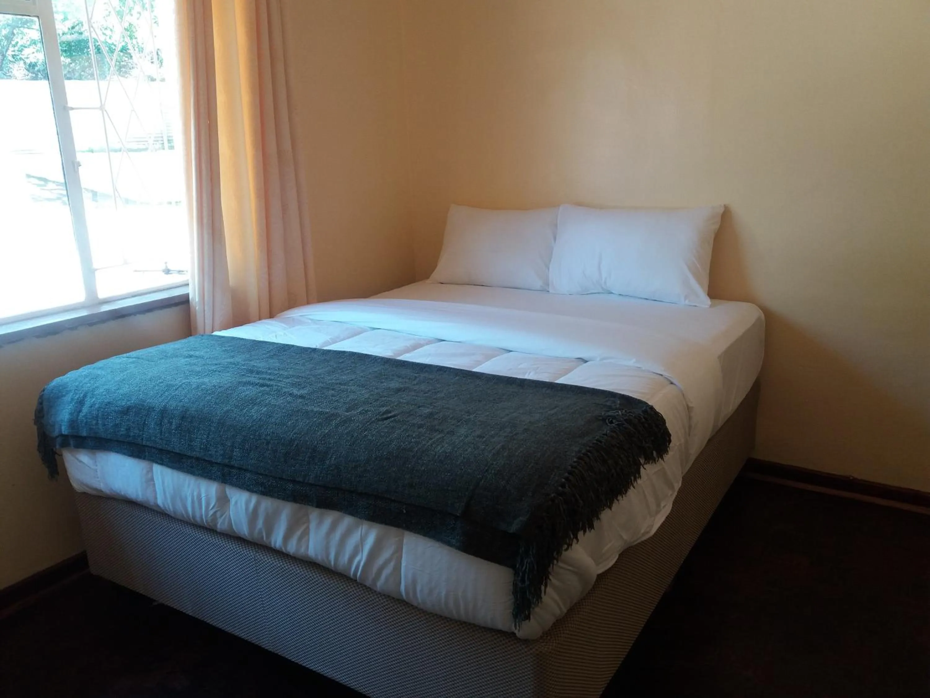 Bed in Royal Guest House