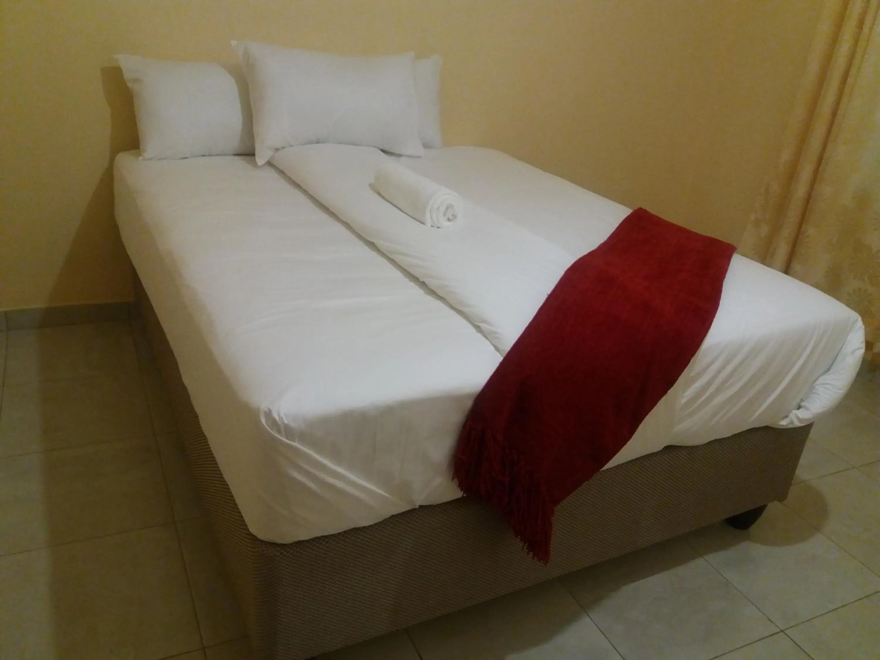 Bed in Royal Guest House