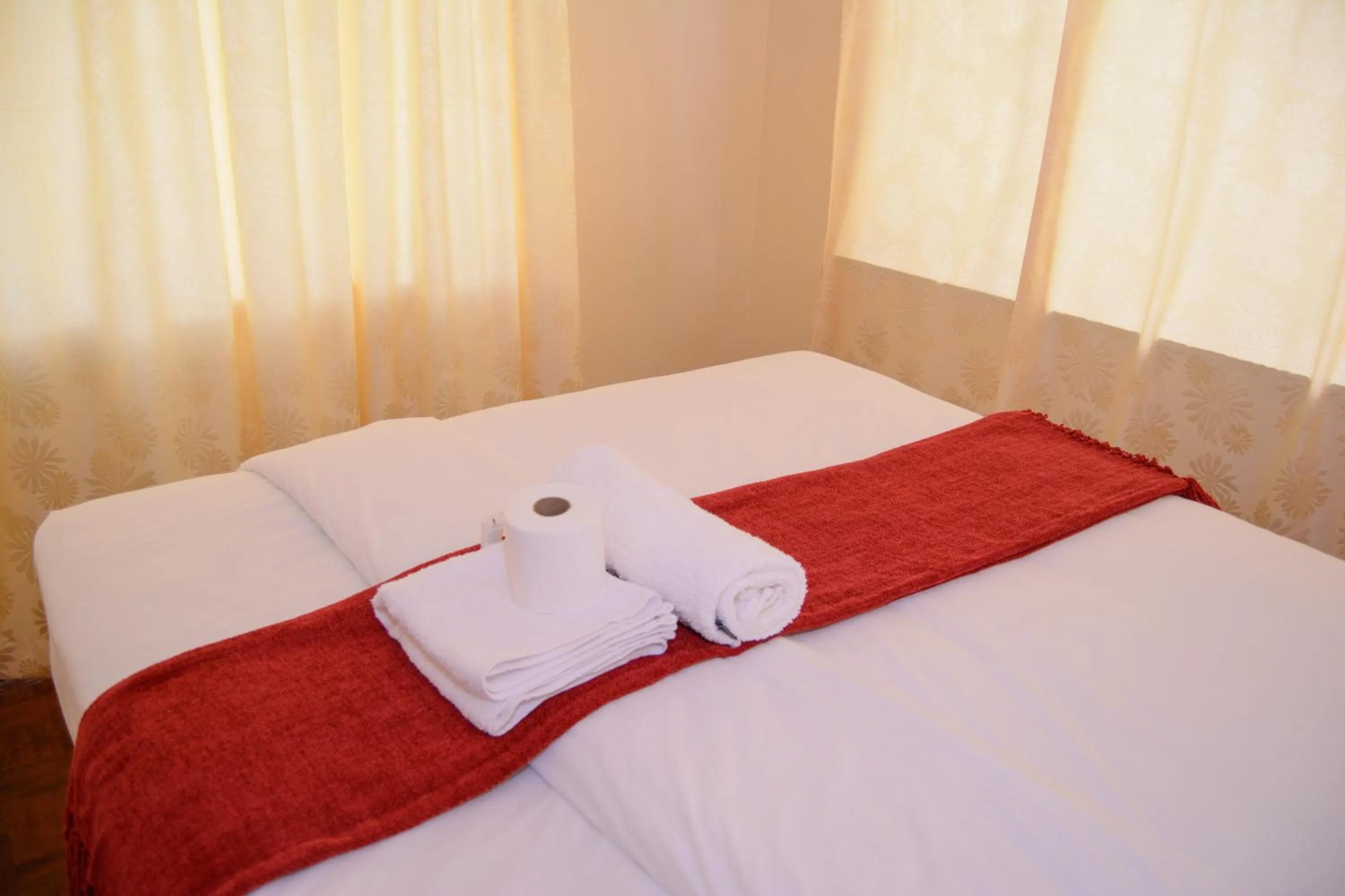 Bed in Royal Guest House