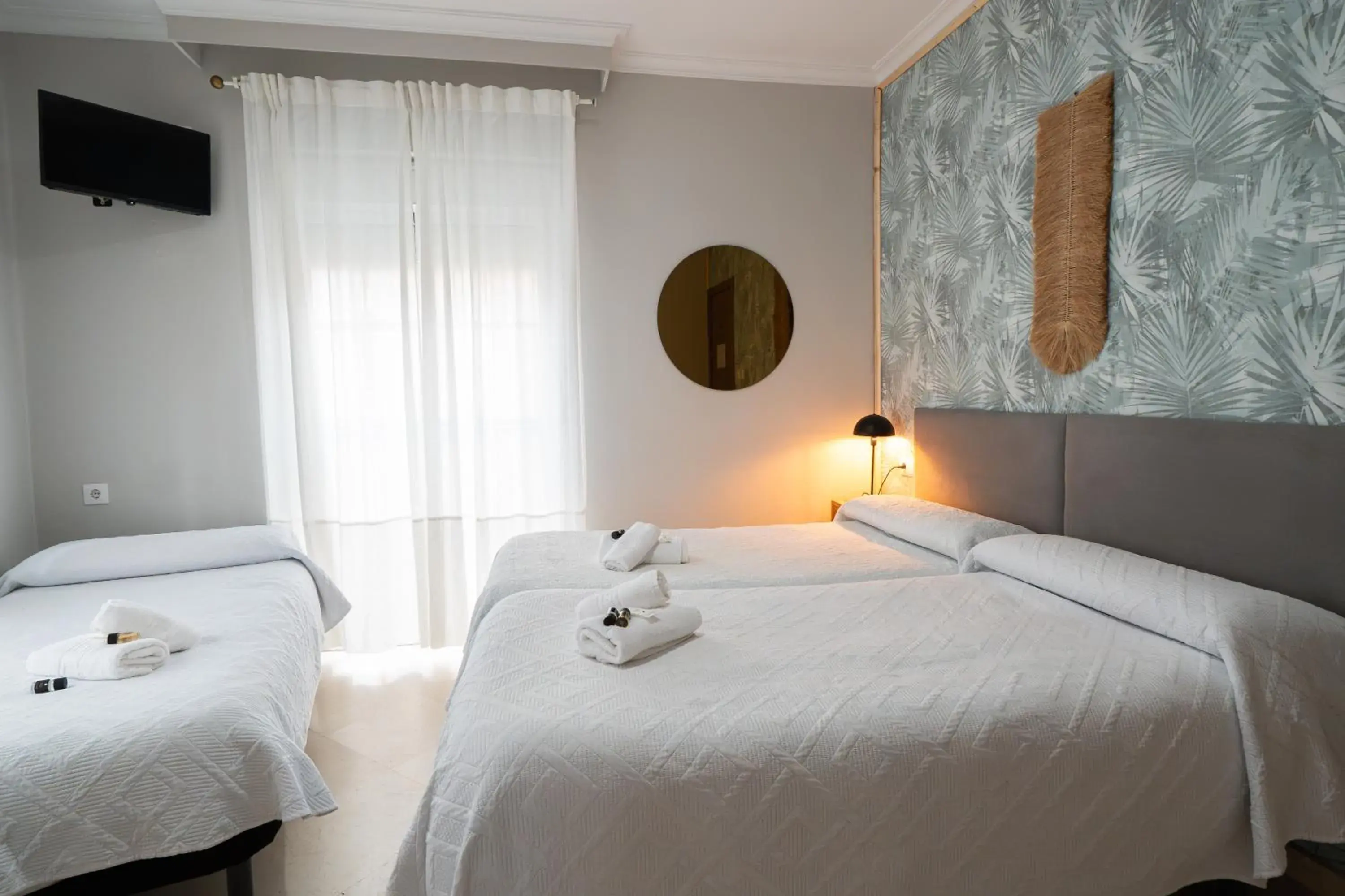 Triple Room with Private Bathroom in Hostal La Muralla Triple Room with Private Bathroom in Hostal La Muralla