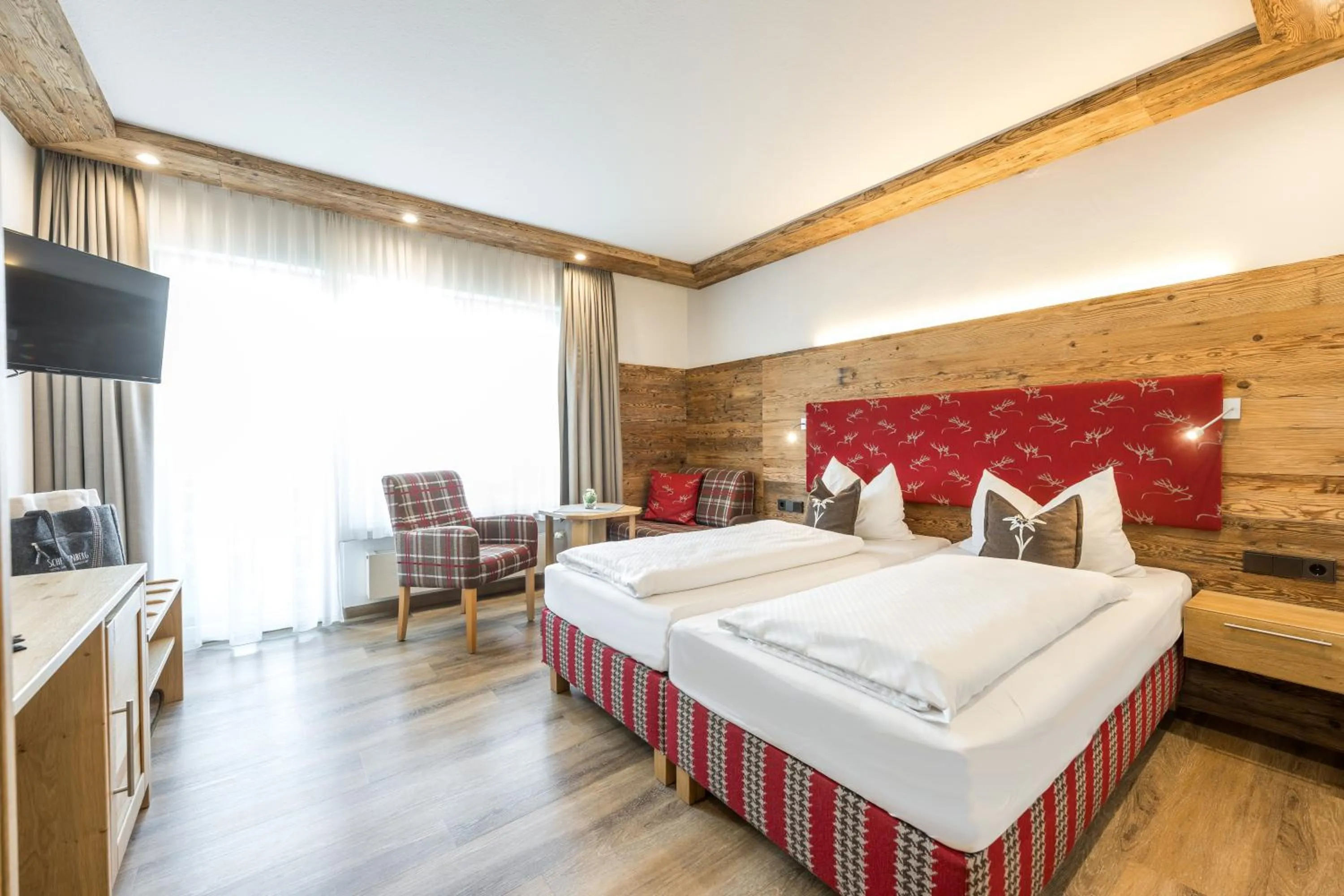 Photo of the whole room, Bed in Hotel Garni Schellenberg