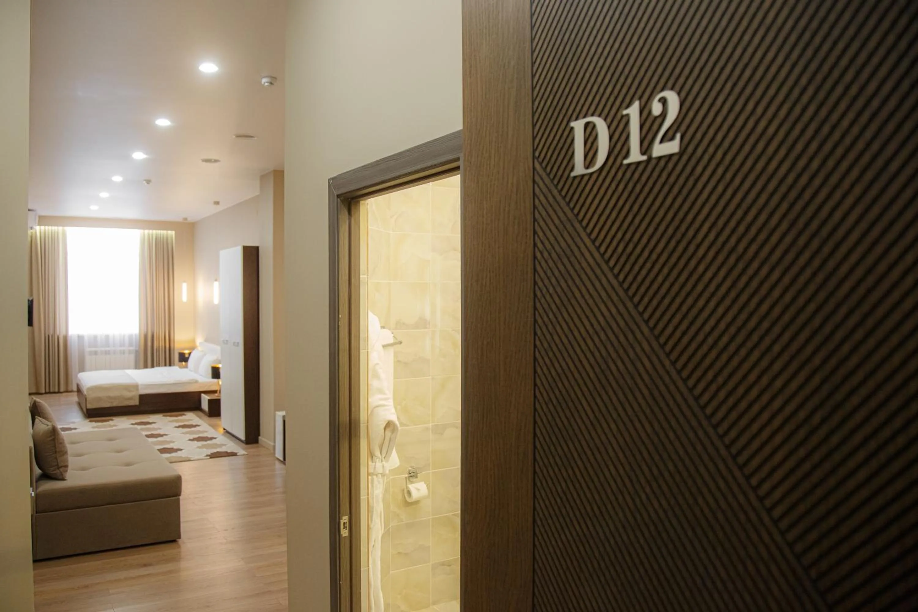 Bed in Baitau Hotel Aktobe