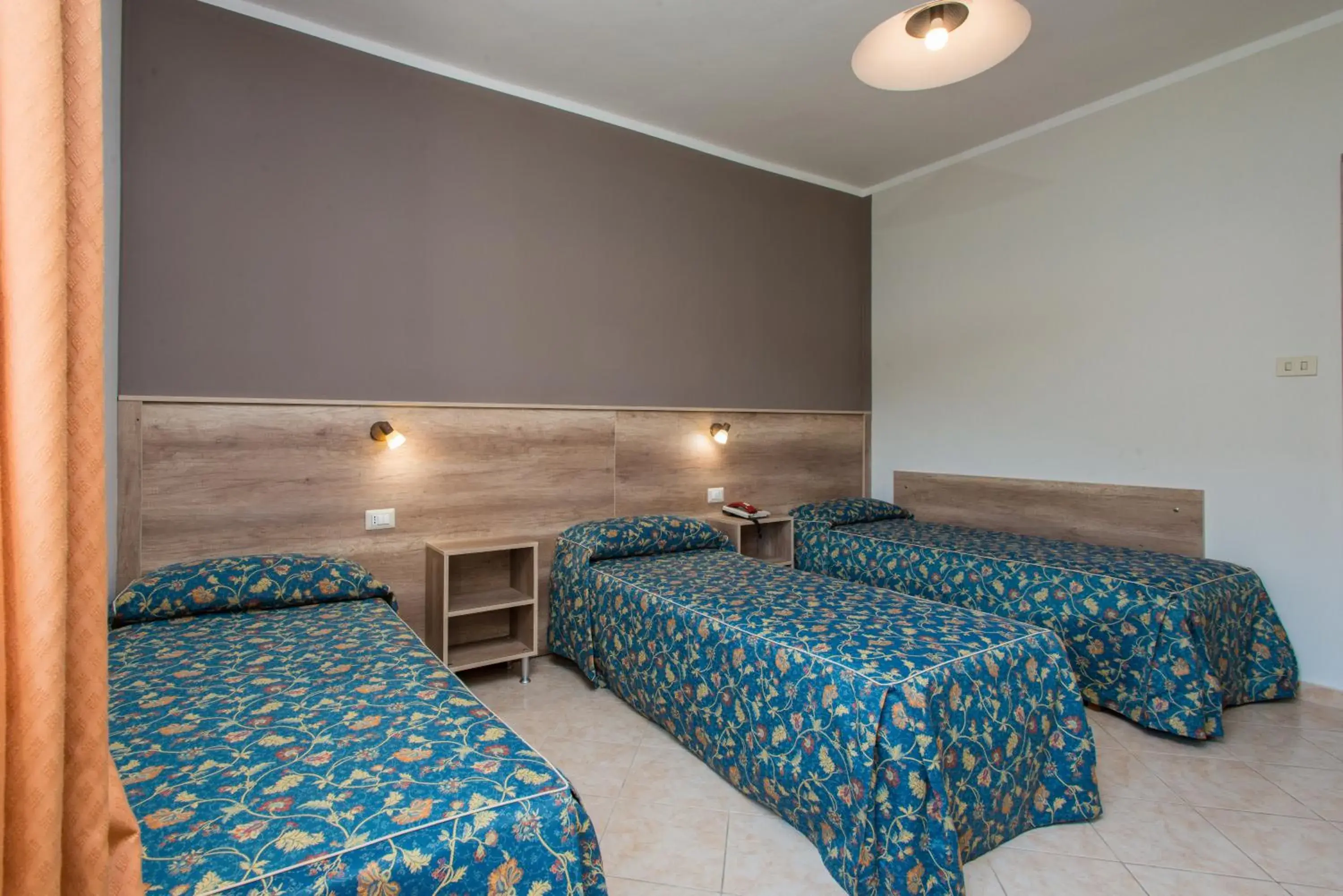 Triple Room in Hotel Tasso Triple Room in Hotel Tasso