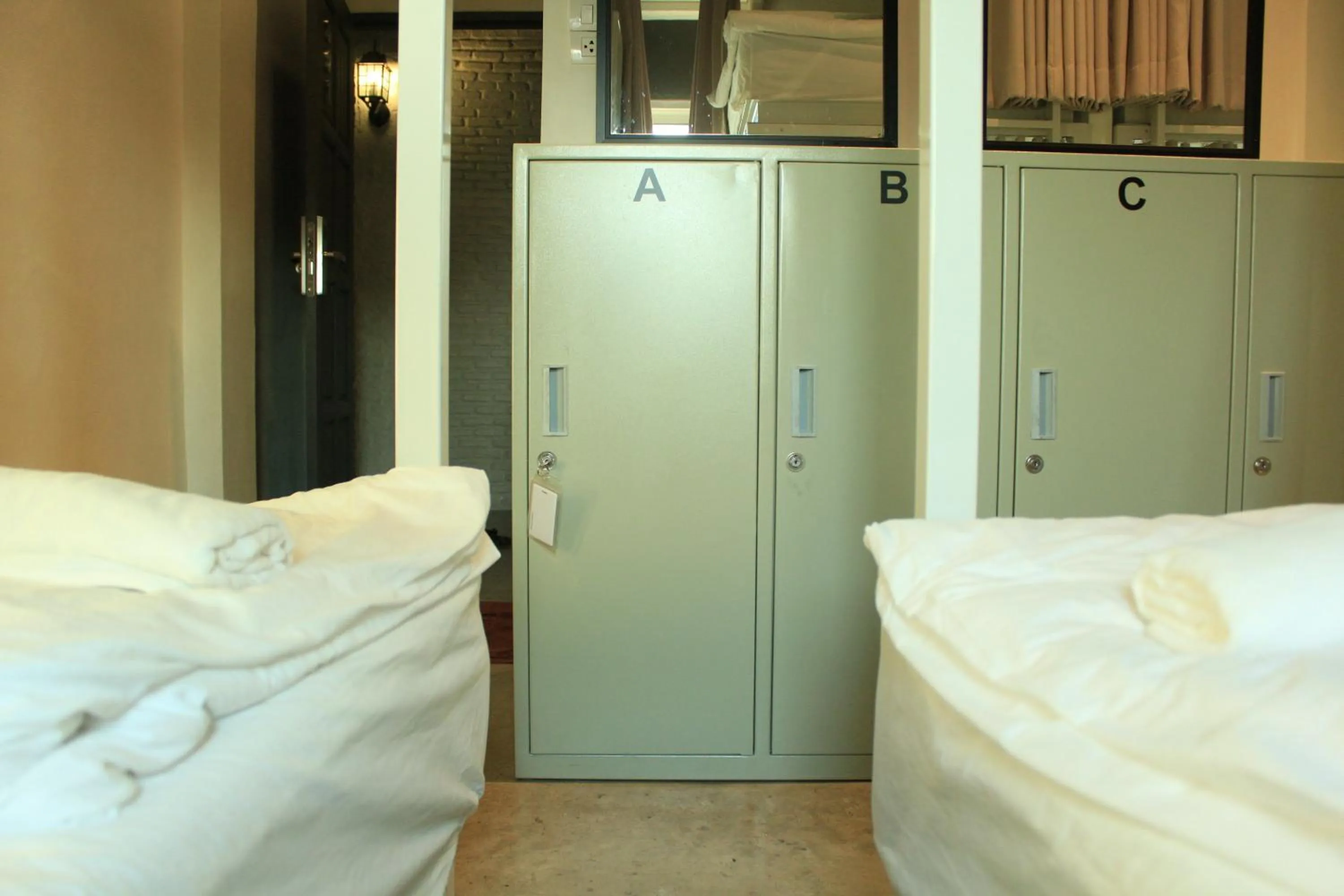 Bed in Jam Hostel Bangkok