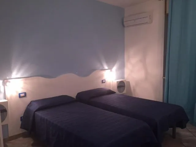 Bed in Hotel Sandalion