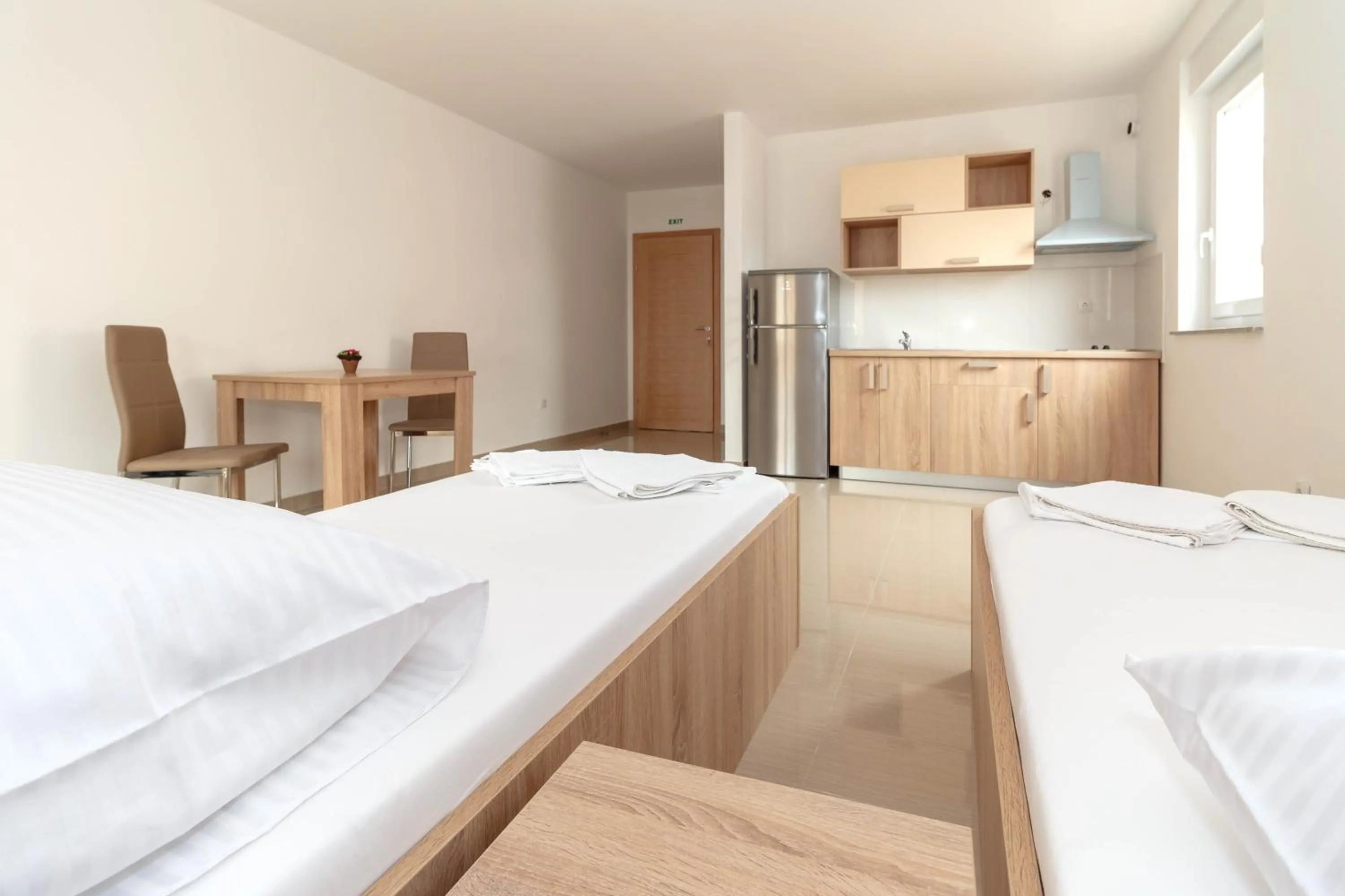 Kitchen or kitchenette, Bed in Summer Fun Apartments