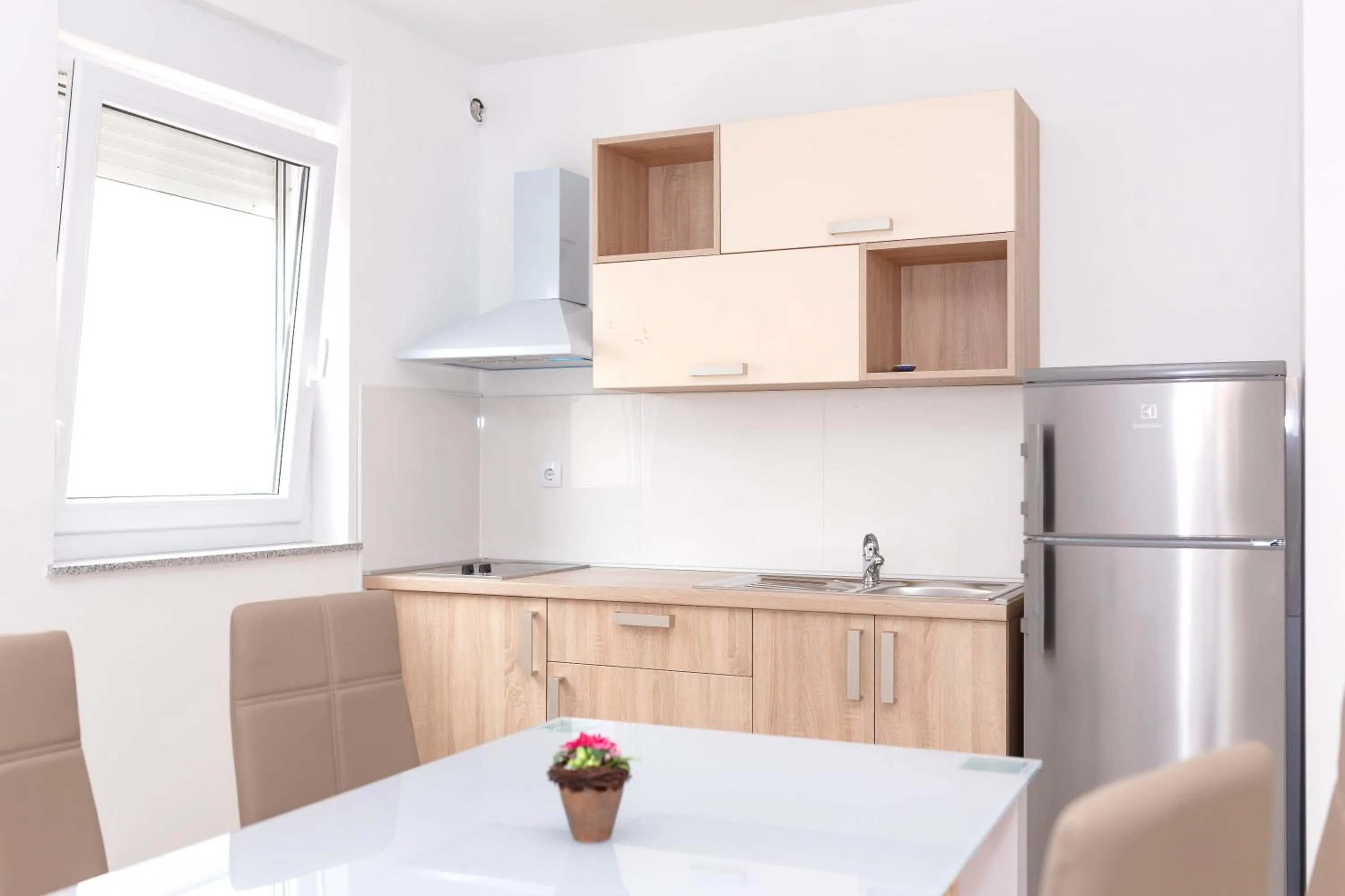 Kitchen or kitchenette in Summer Fun Apartments