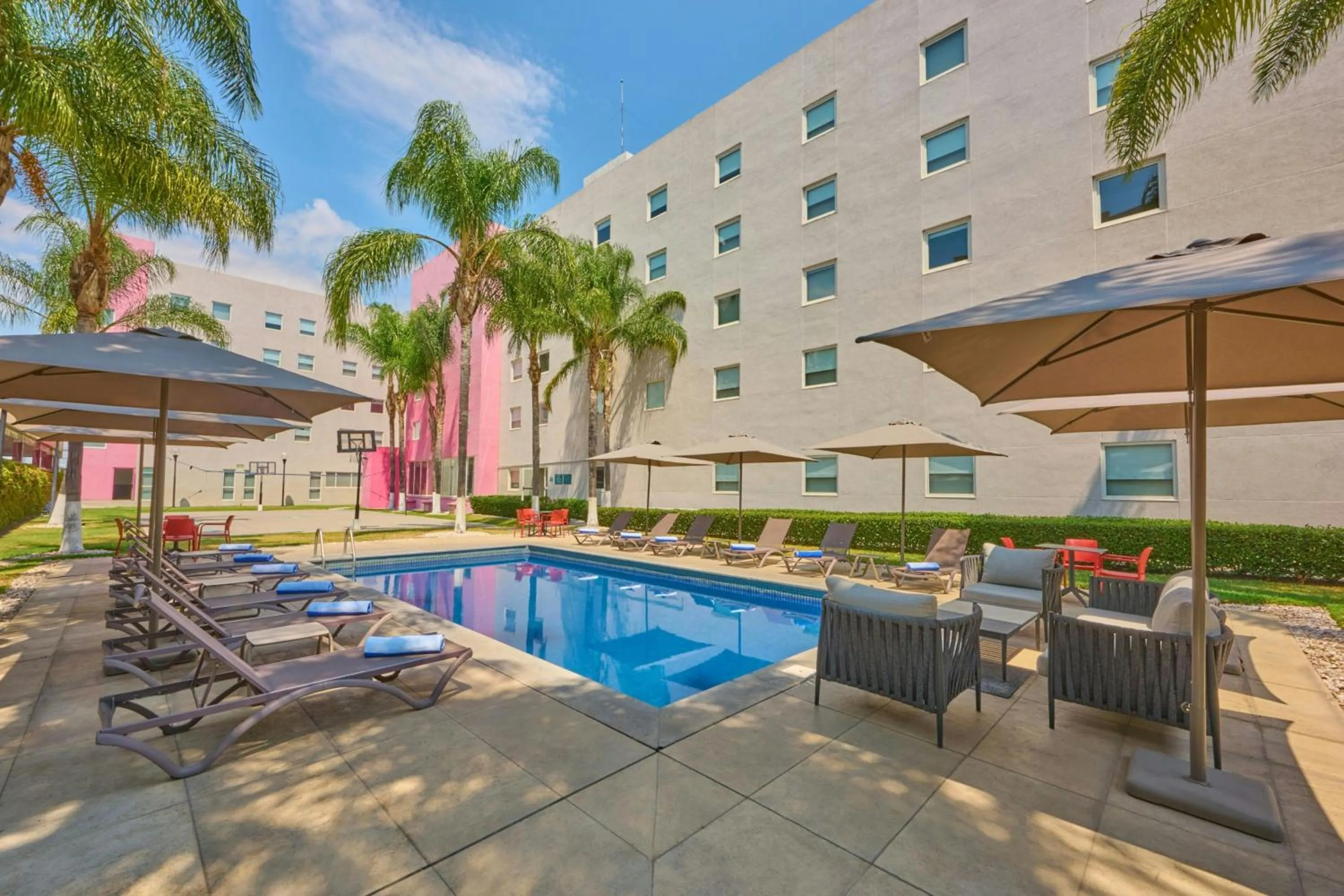 Swimming pool in City Express Suites by Marriott Queretaro