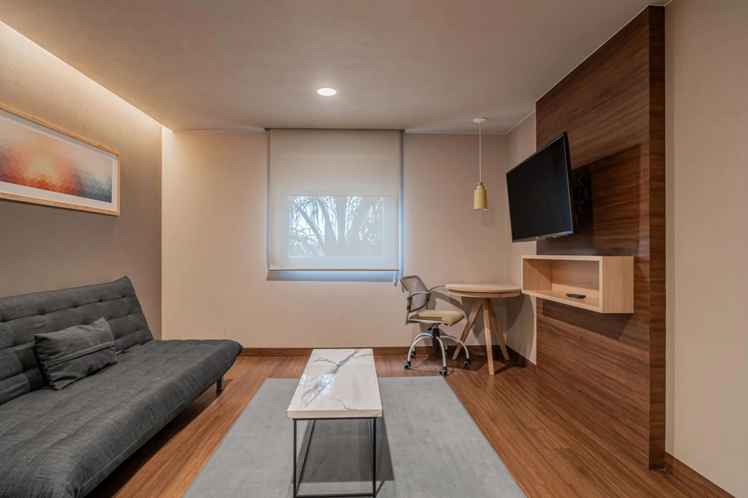 Living room in City Express Suites by Marriott Queretaro