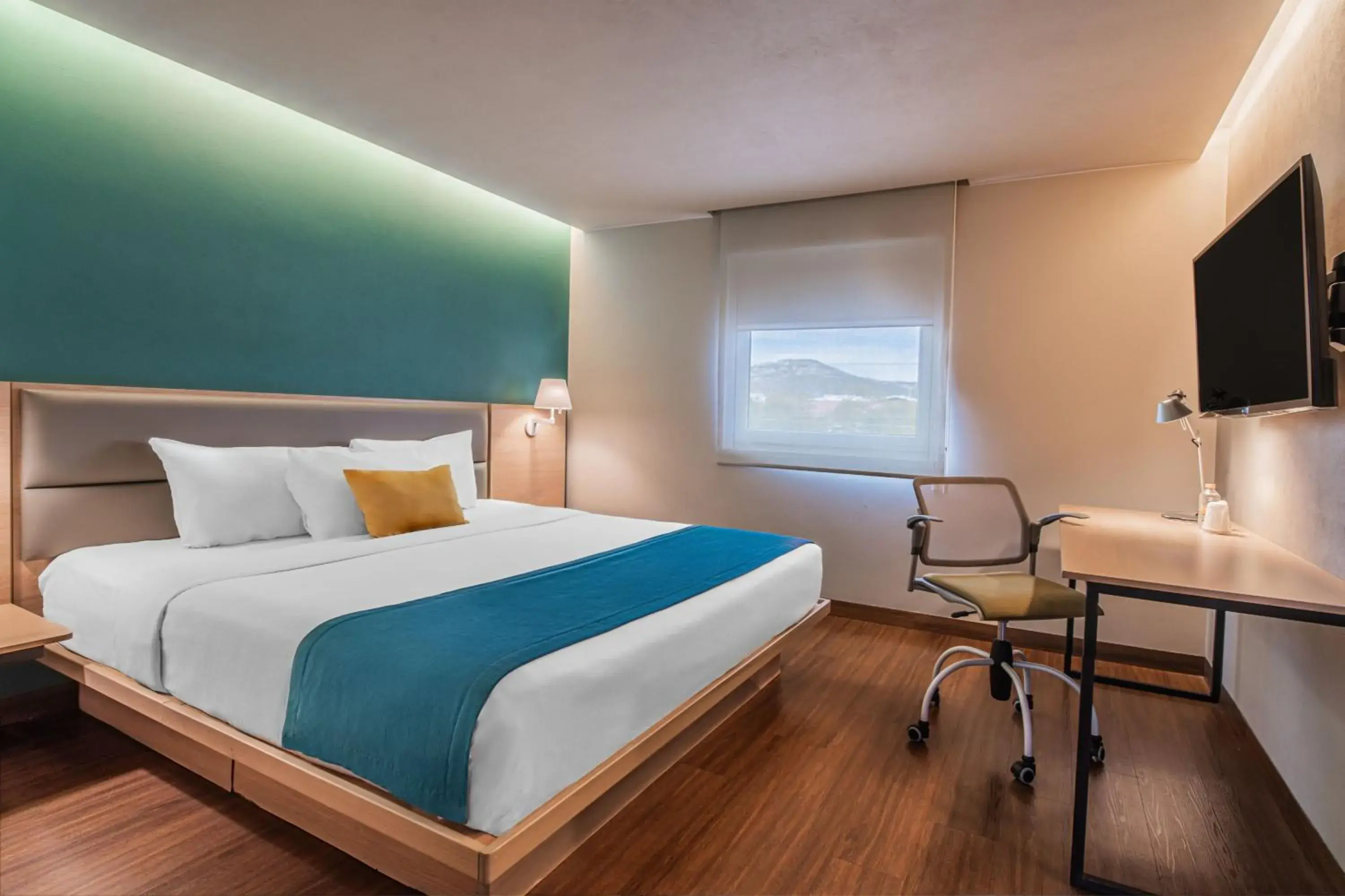 Two-Bedroom Suite with One King and Two Double Beds with Sofa Bed and Kitchenette in City Express Suites by Marriott Queretaro Two-Bedroom Suite with One King and Two Double Beds with Sofa Bed and Kitchenette in City Express Suites by Marriott Queretaro