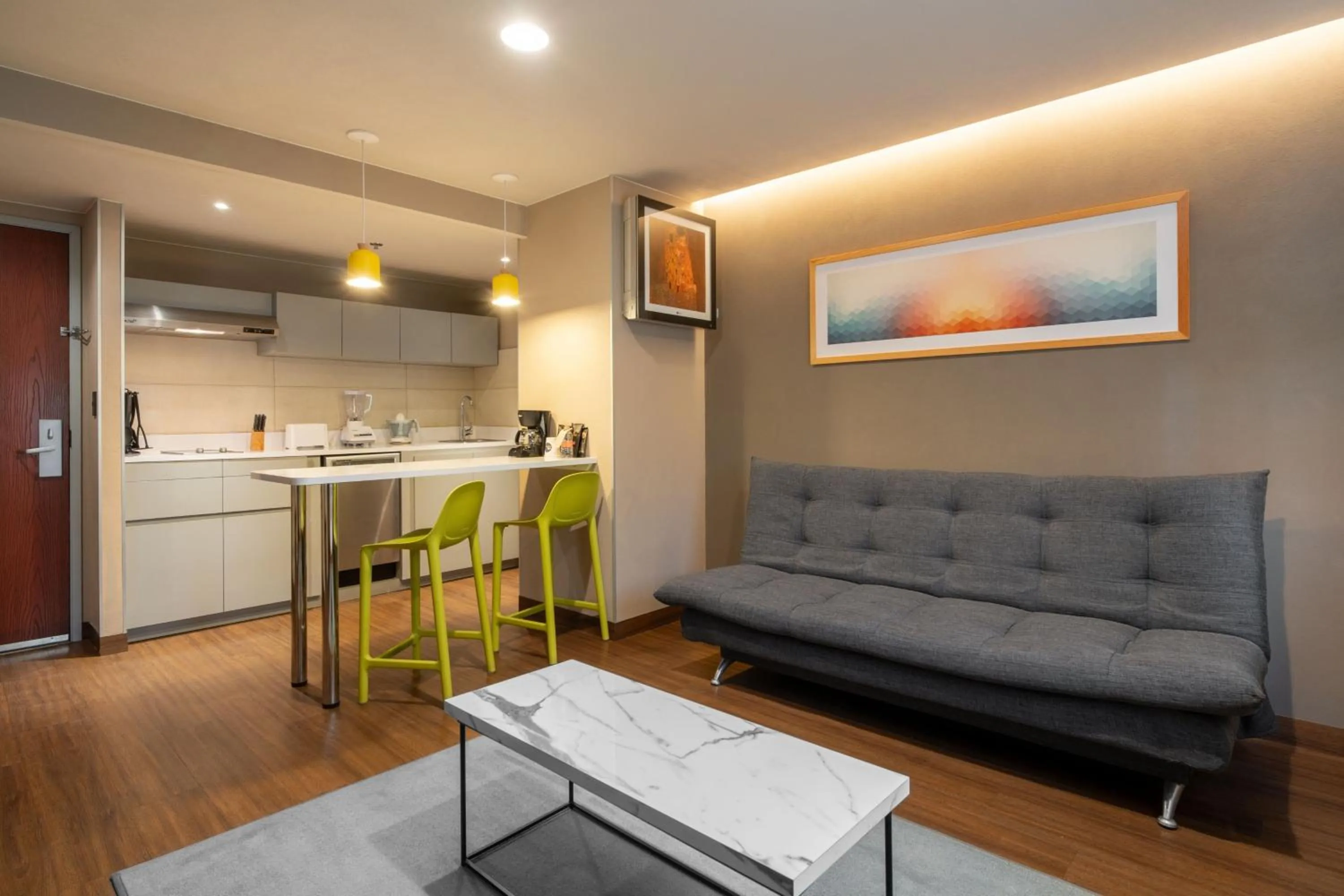 Living room in City Express Suites by Marriott Queretaro