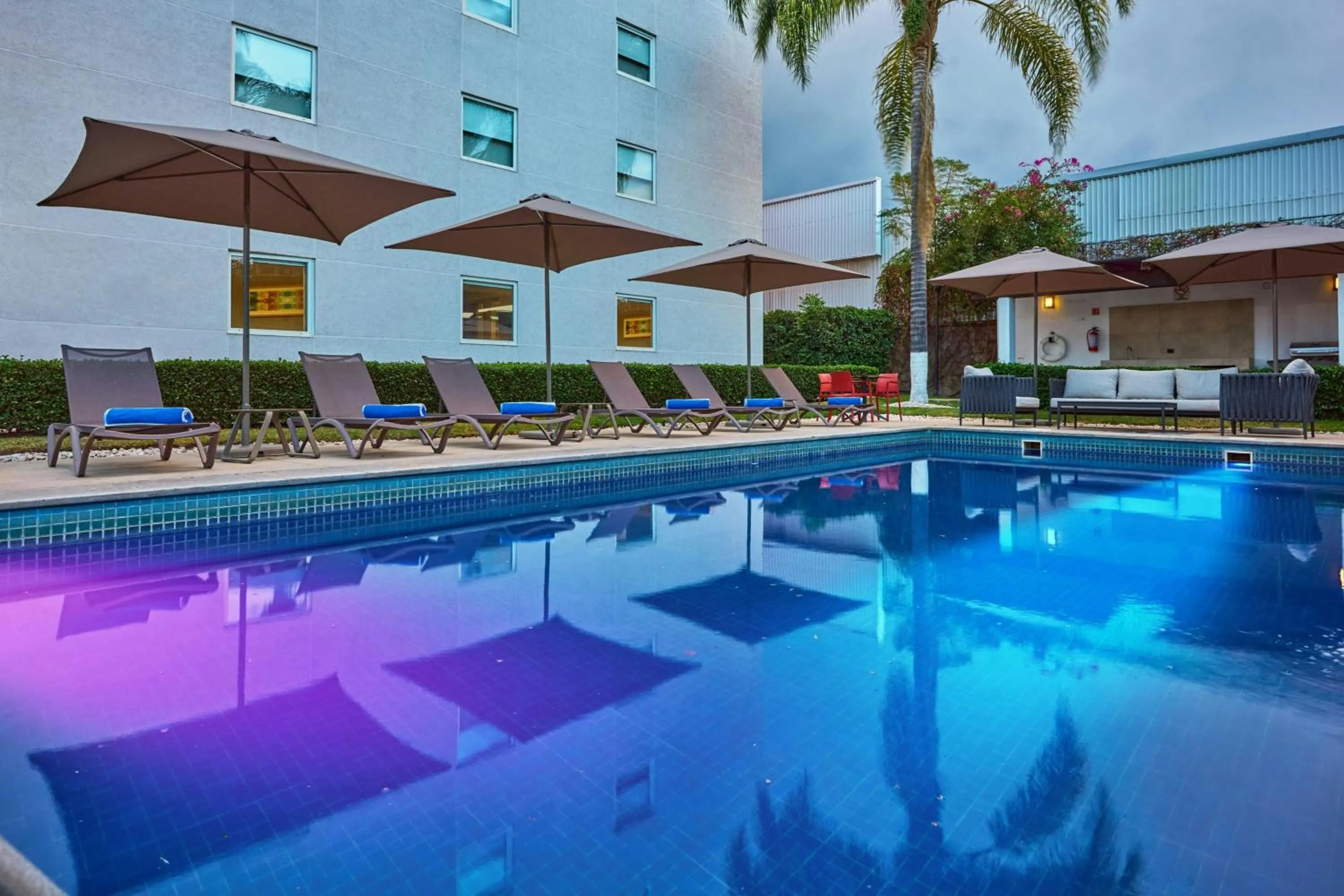 Swimming pool in City Express Suites by Marriott Queretaro
