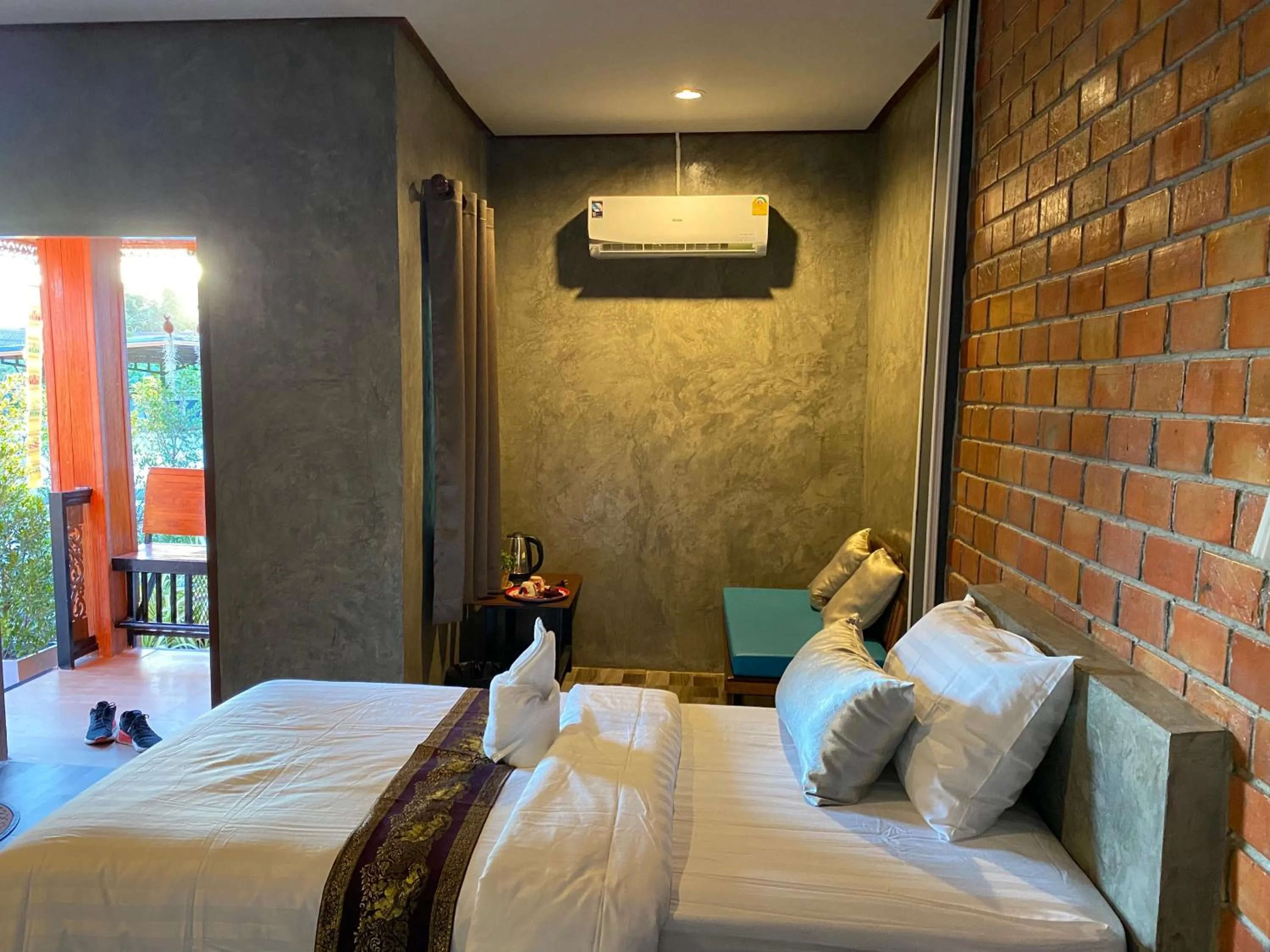 Bed in Khum Lanna Boutique Hotel