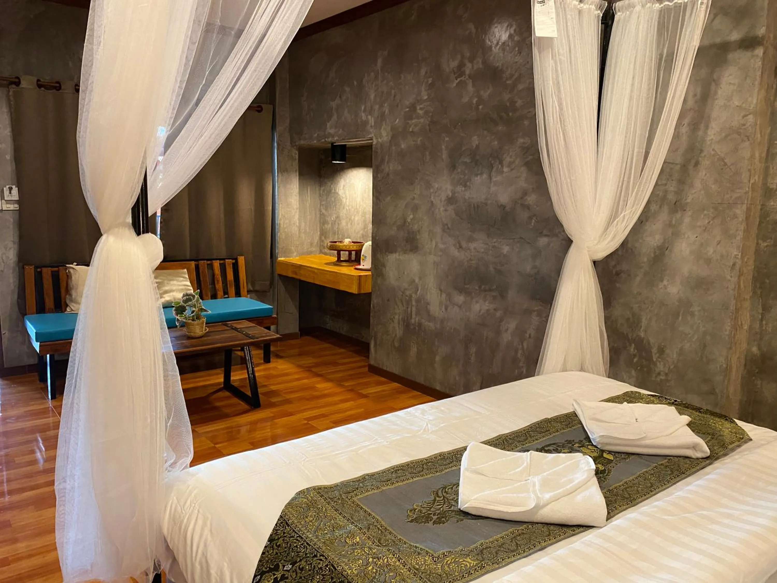 Bed in Khum Lanna Boutique Hotel