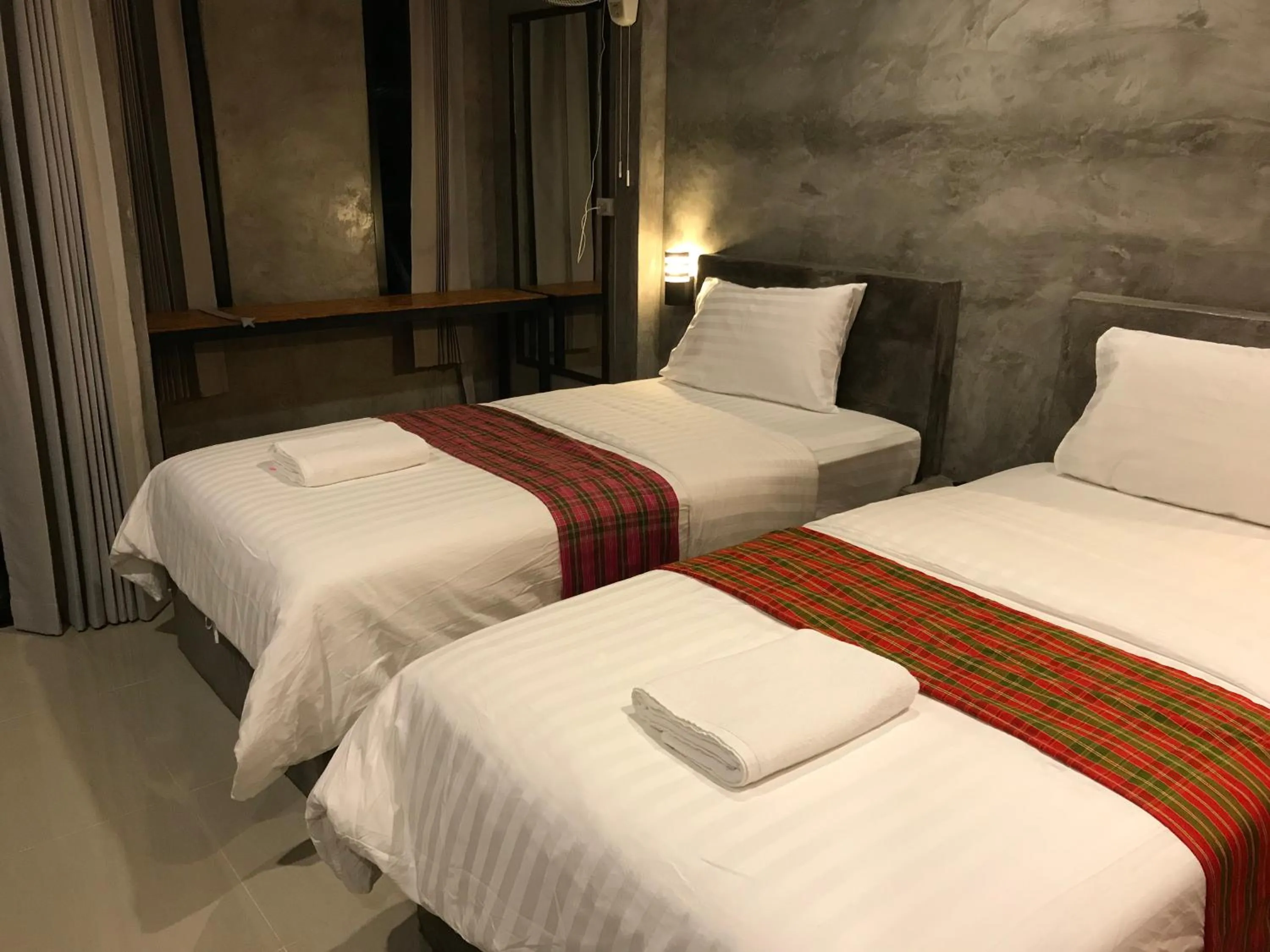 Bed in Khum Lanna Boutique Hotel