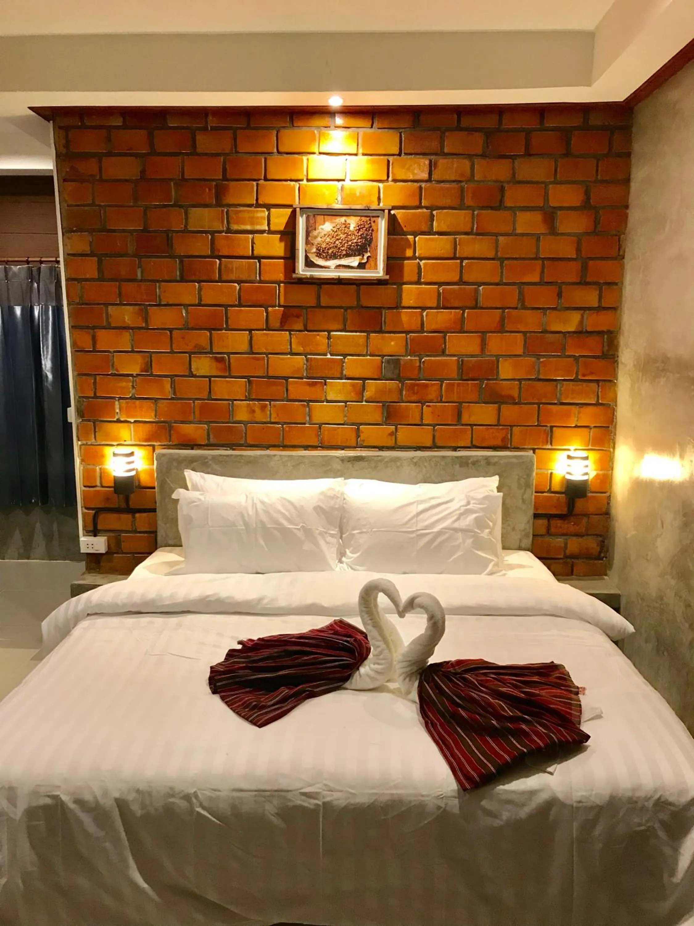 Bed in Khum Lanna Boutique Hotel