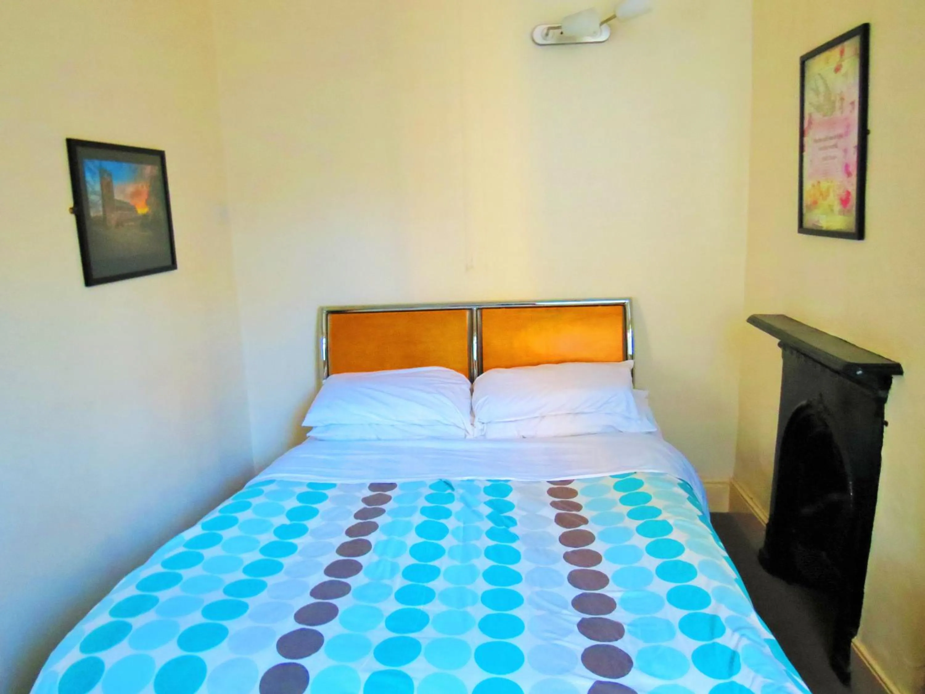 Bed in The Apothecary Guest House