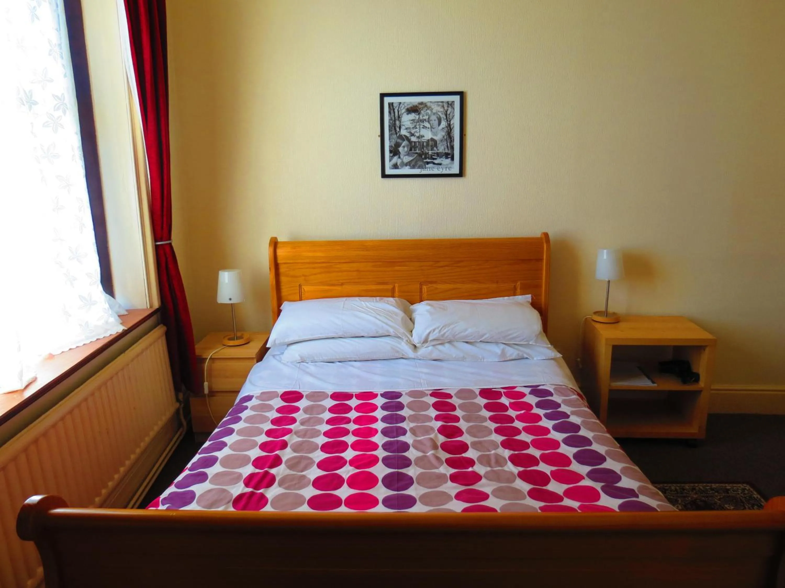 Bed in The Apothecary Guest House