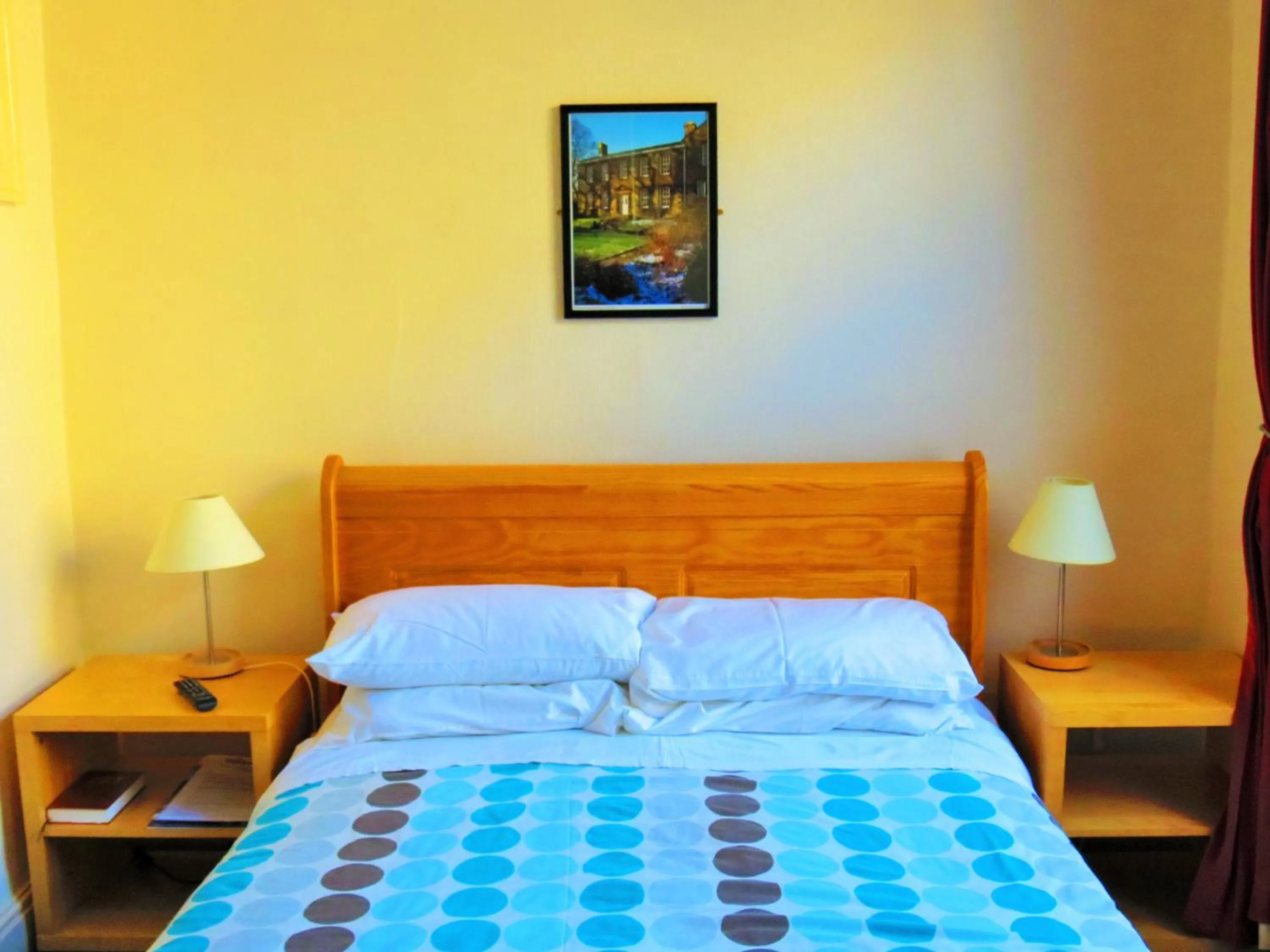 Bed in The Apothecary Guest House