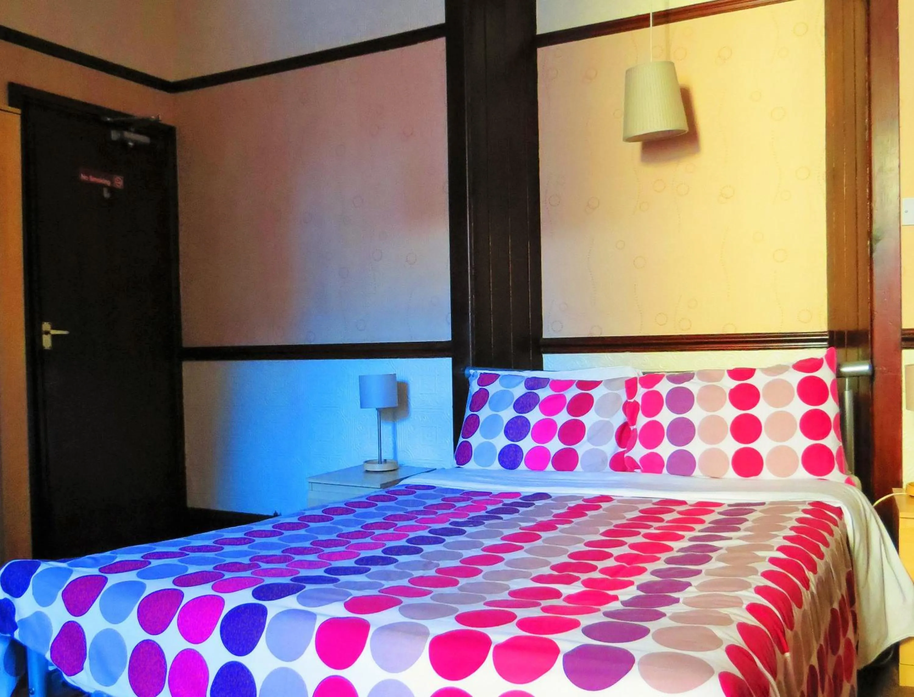 Bed in The Apothecary Guest House